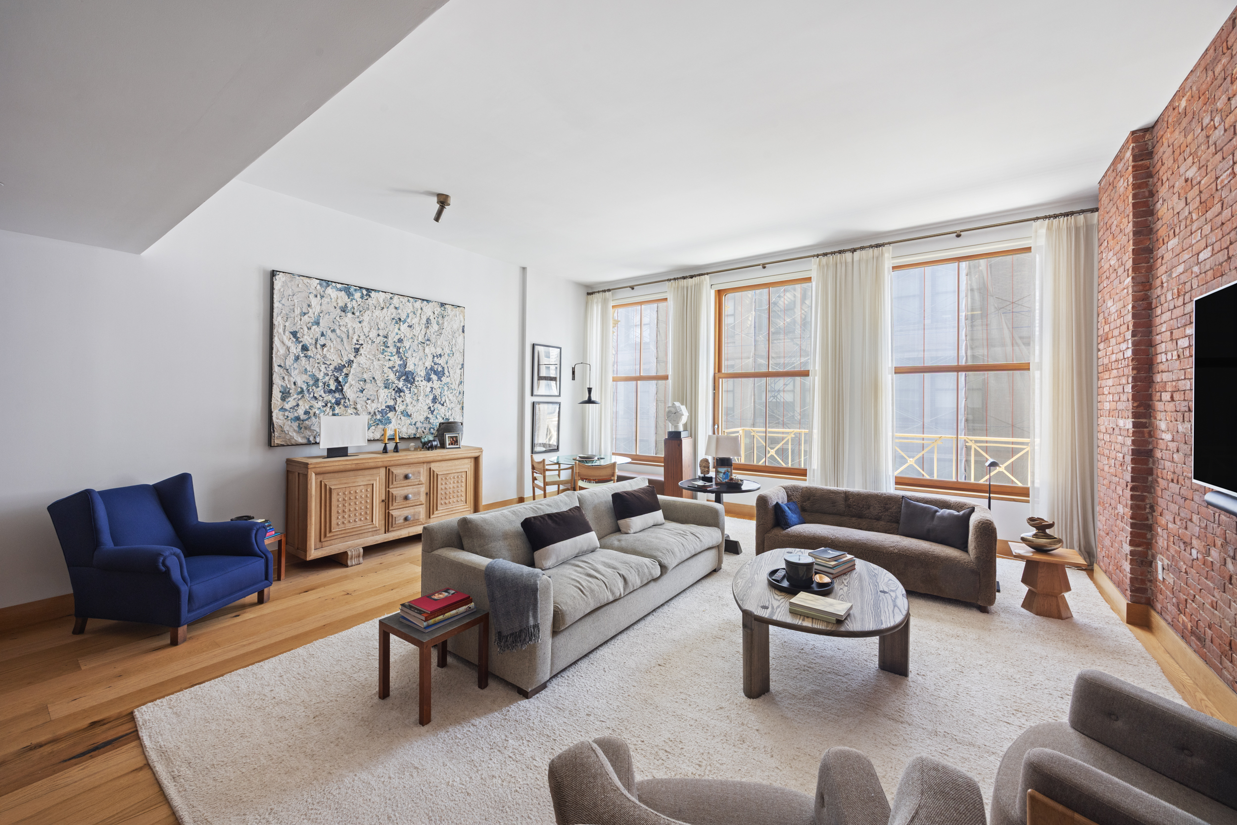 60 White Street, Unit 4E Manhattan, NY 10013 - Photo 5 of 19 a living room with furniture or couch and a large window