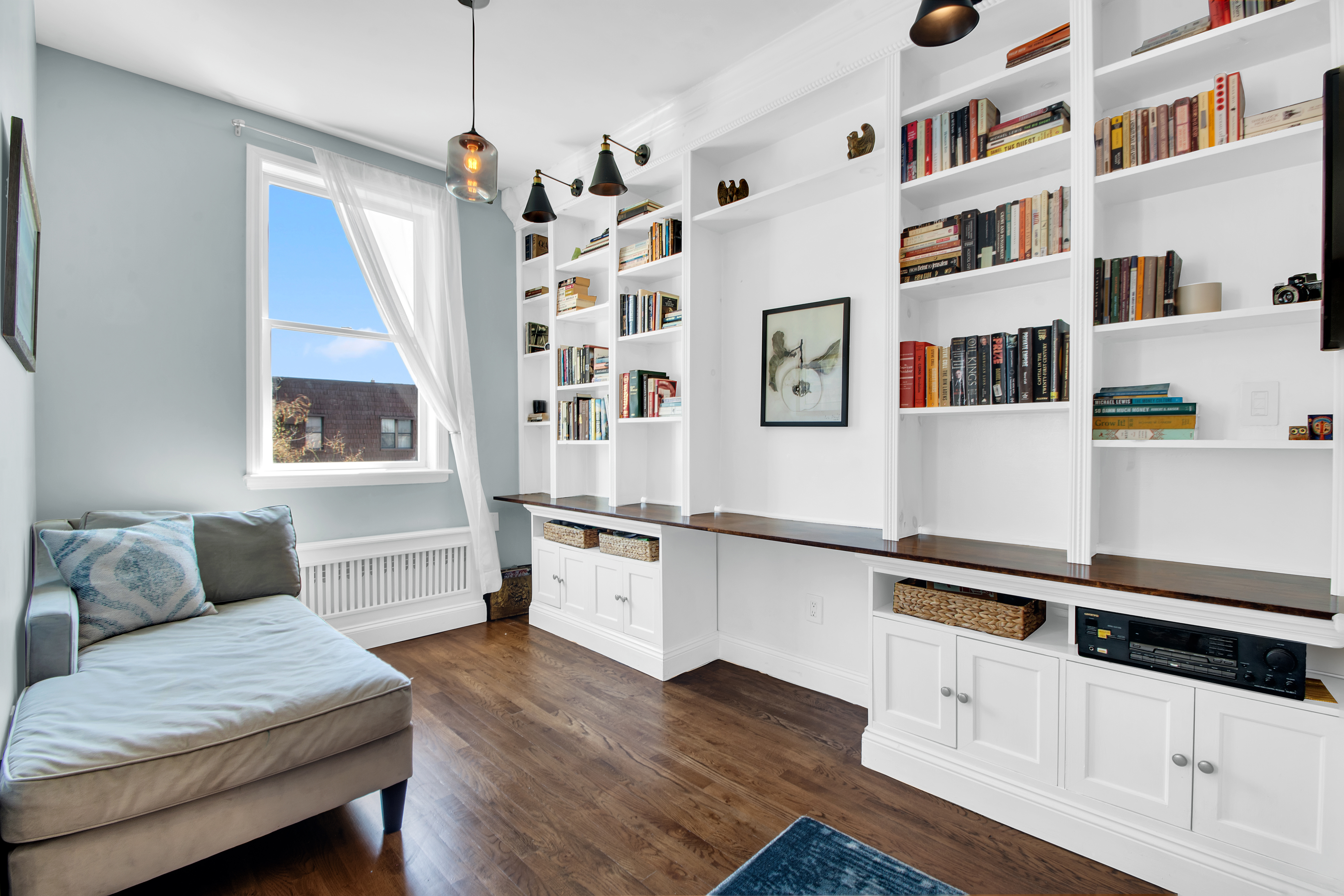 594 6th Avenue, Unit 3 Brooklyn, NY 11215 - Photo 3 of 11 a living room with furniture and decor