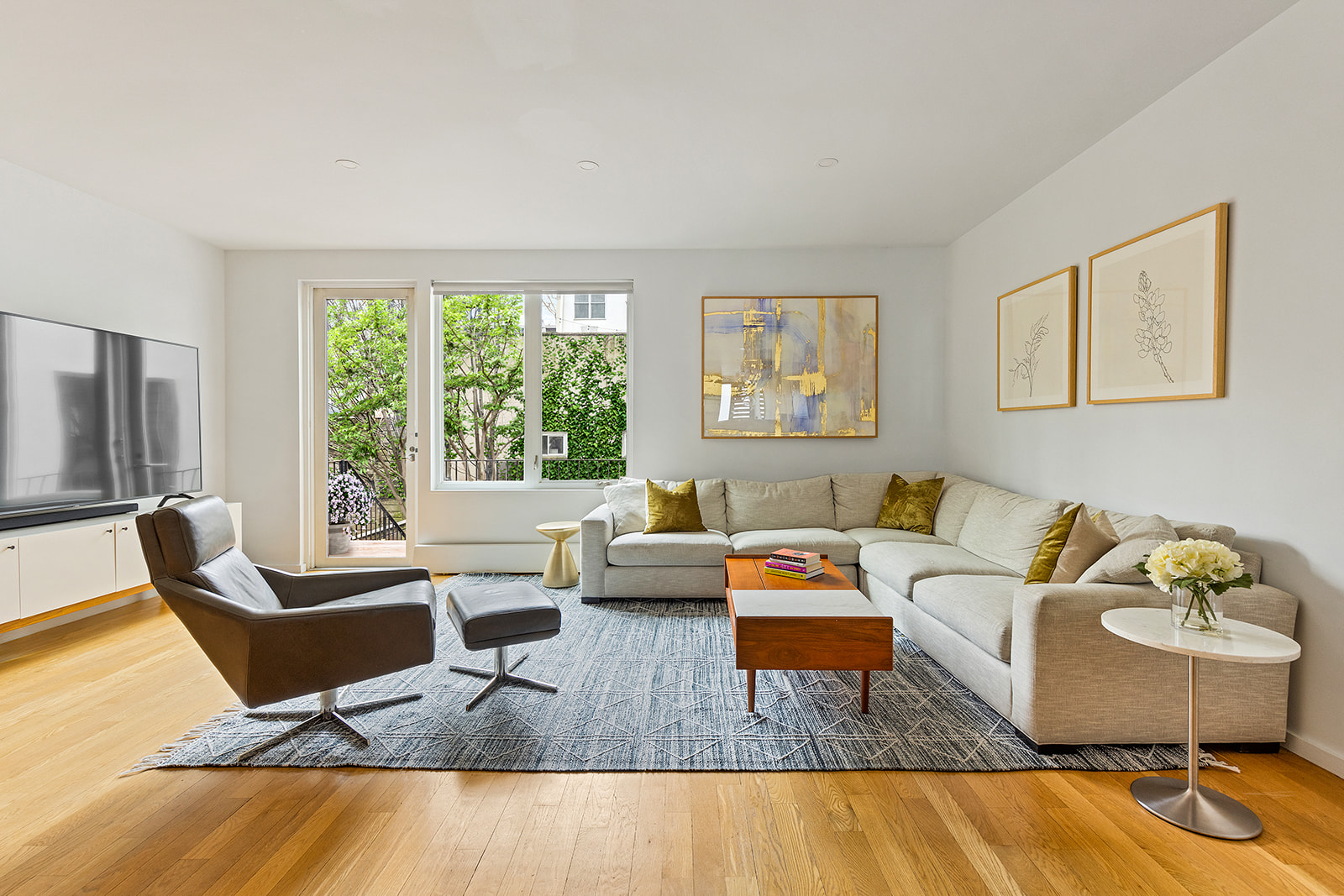 115 3rd Street, Unit 1 Brooklyn, NY 11231 - Photo 1 of 13 a living room with furniture and a window