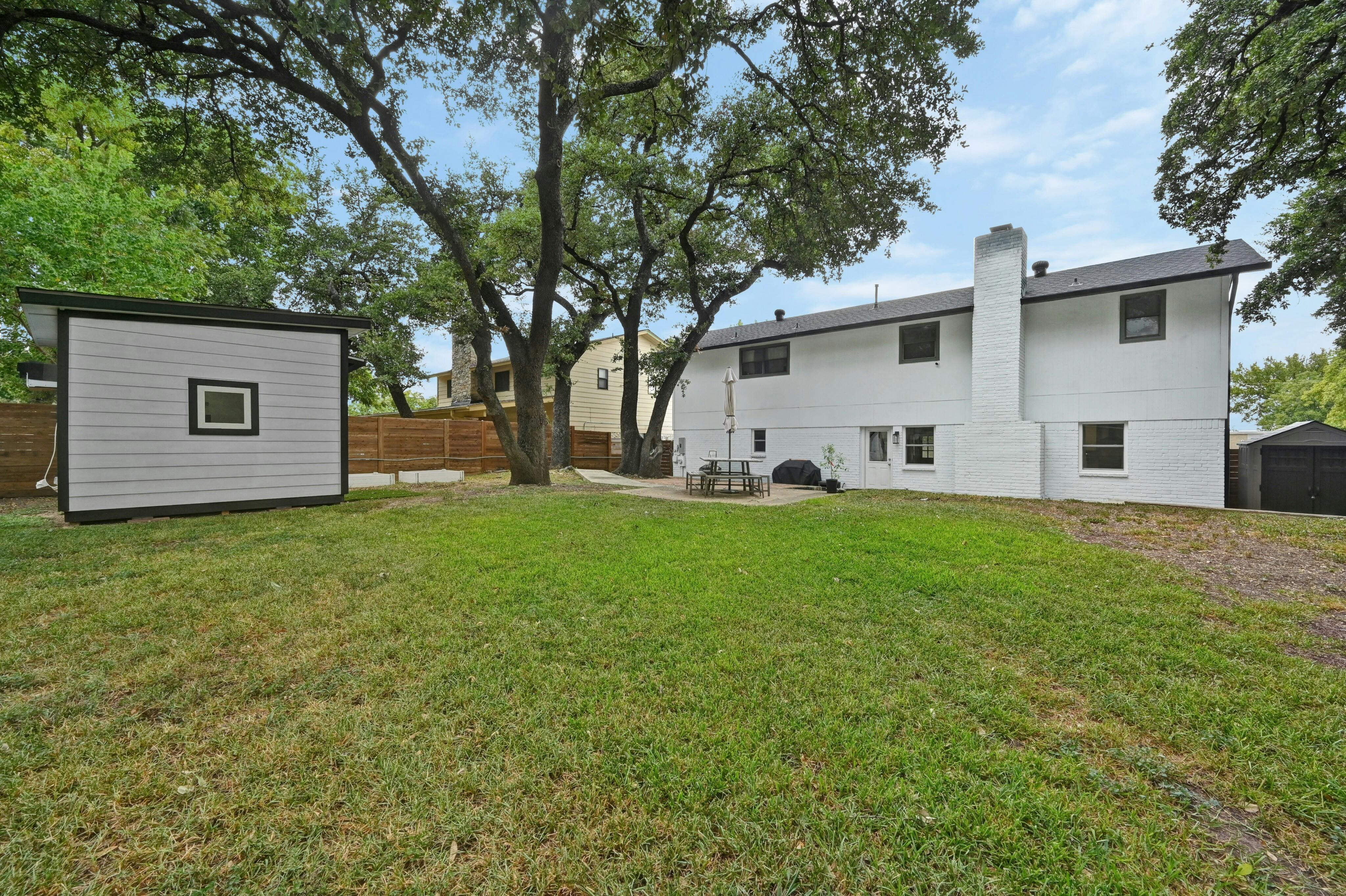 Address Upon Request Austin, TX 78745 - Photo 18 of 19 a view of a white house with a yard