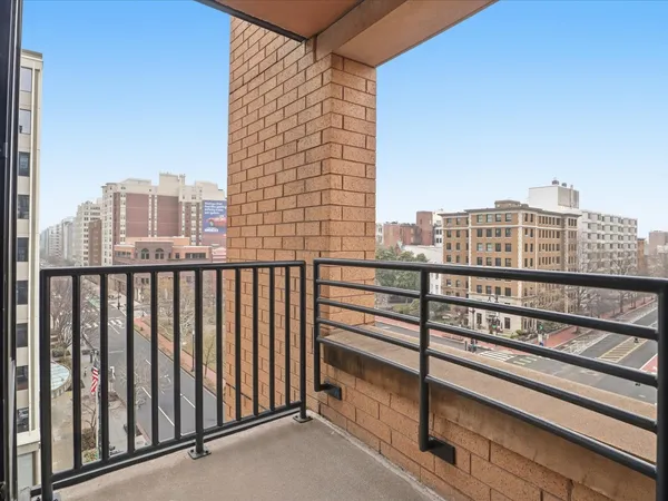 a view of a balcony with city view