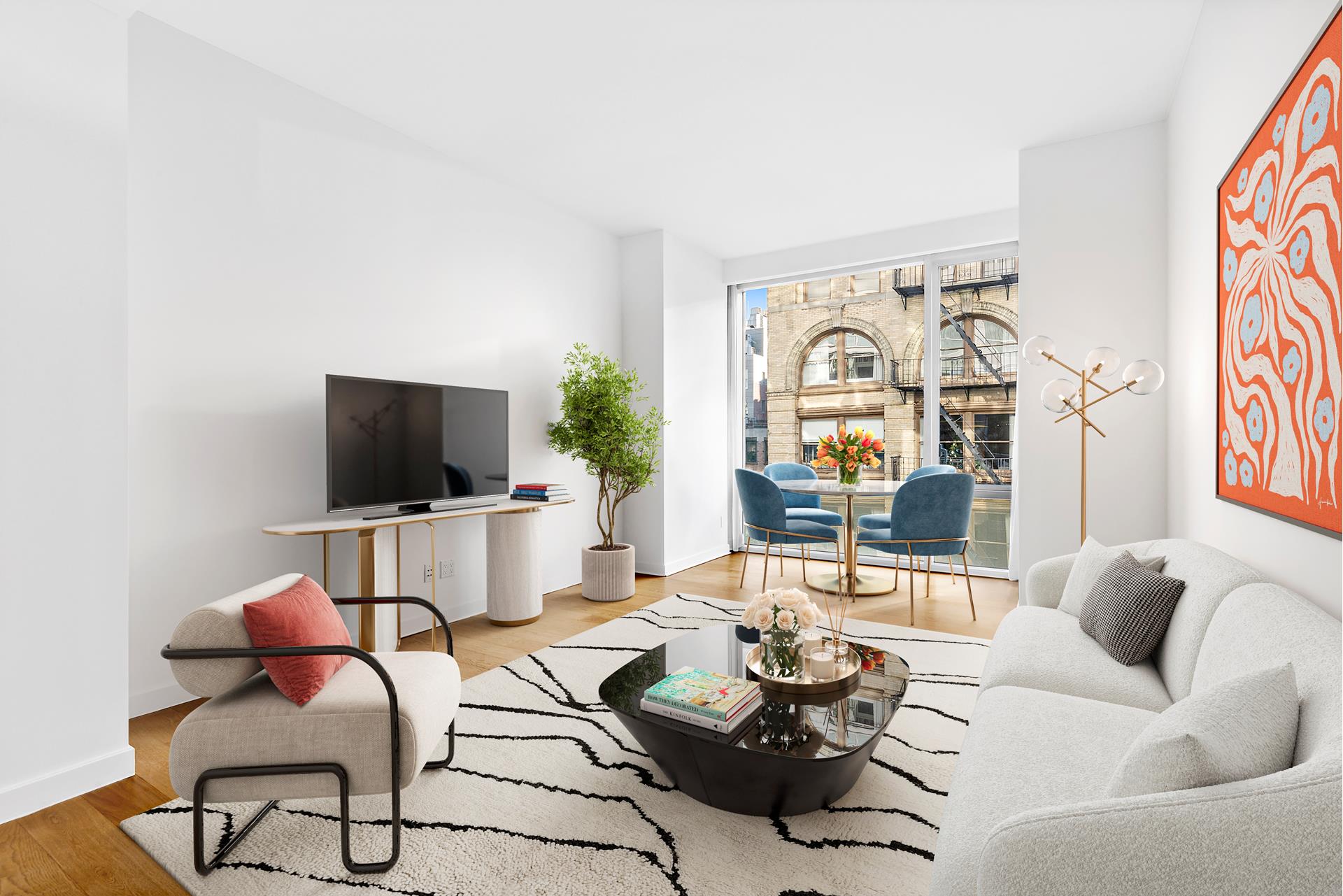 a living room with furniture and a flat screen tv