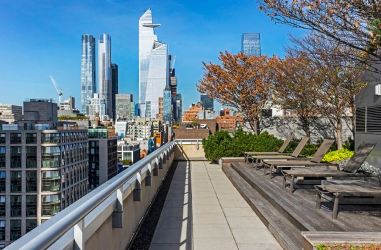 a view of a balcony with city view