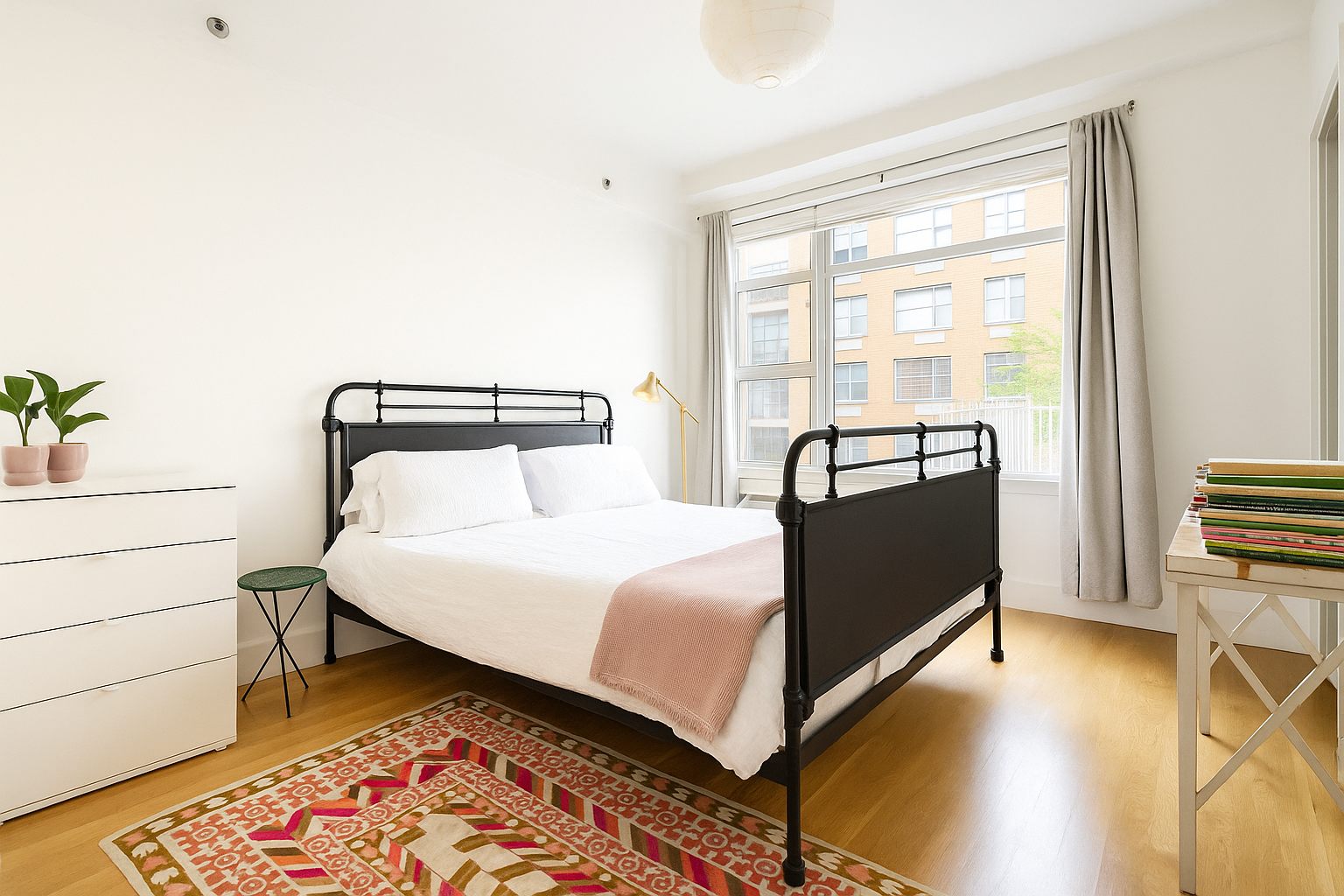 29 South 3rd Street, Unit 2A Brooklyn, NY 11249 - Photo 6 of 17 a bedroom with a bed and a window