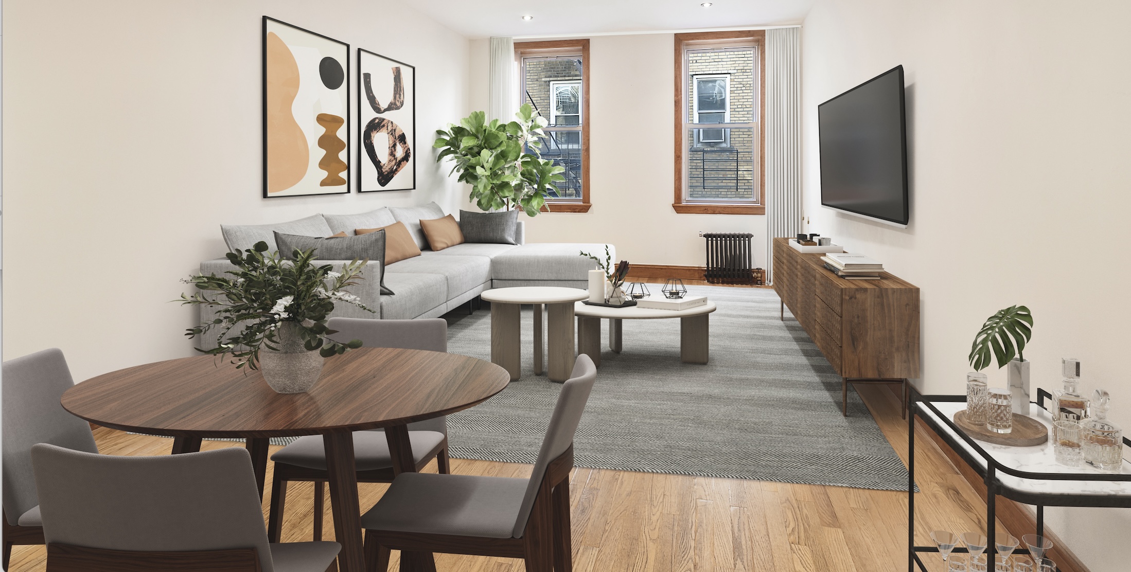 a living room with furniture and a flat screen tv