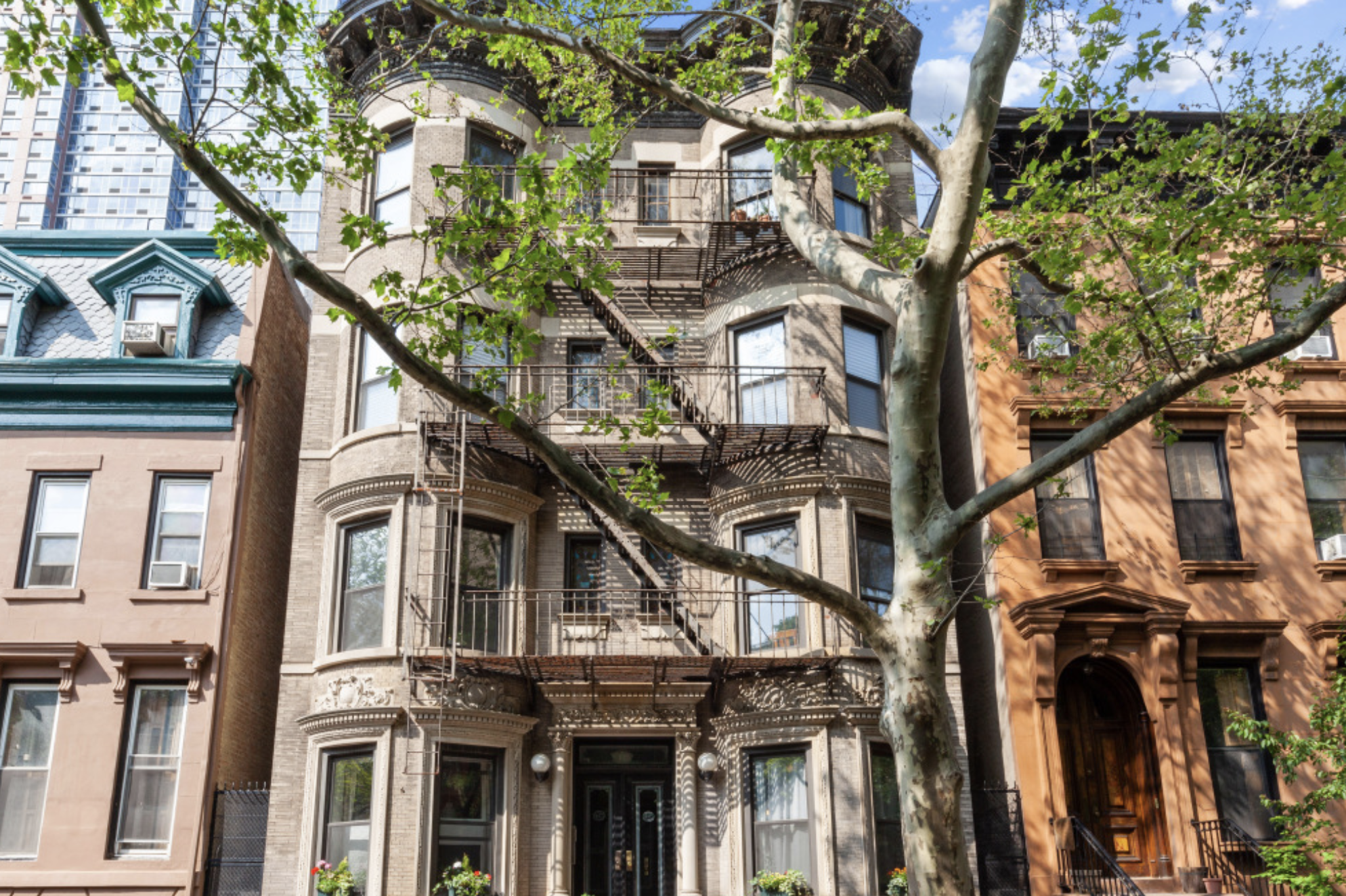 457 State Street, Unit 4BC Brooklyn, NY 11217 - Photo 11 of 13 a house that has a tree in front of it