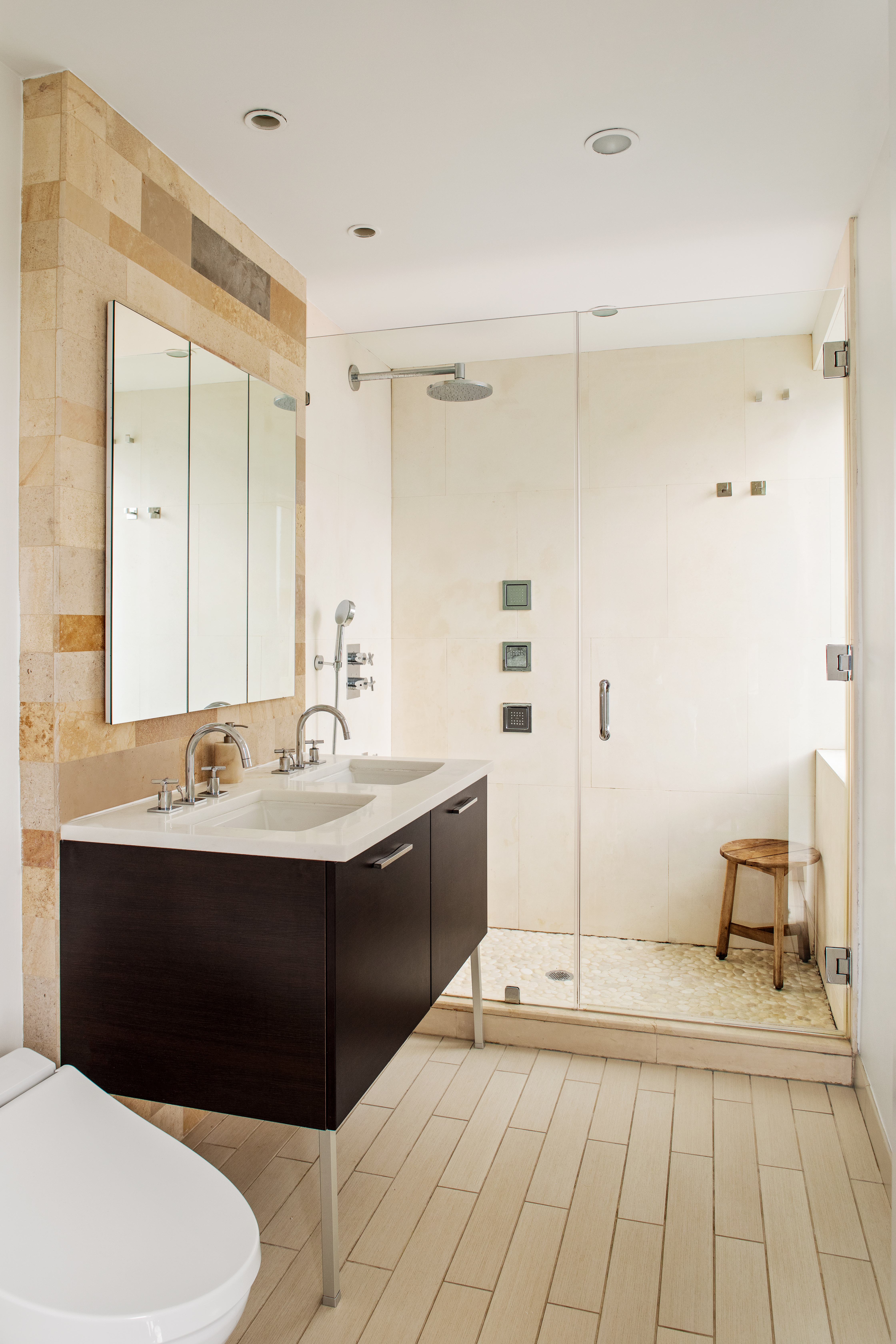 130 West 20th Street, Unit PH11A Manhattan, NY 10011 - Photo 7 of 9 a bathroom with a sink and a mirror