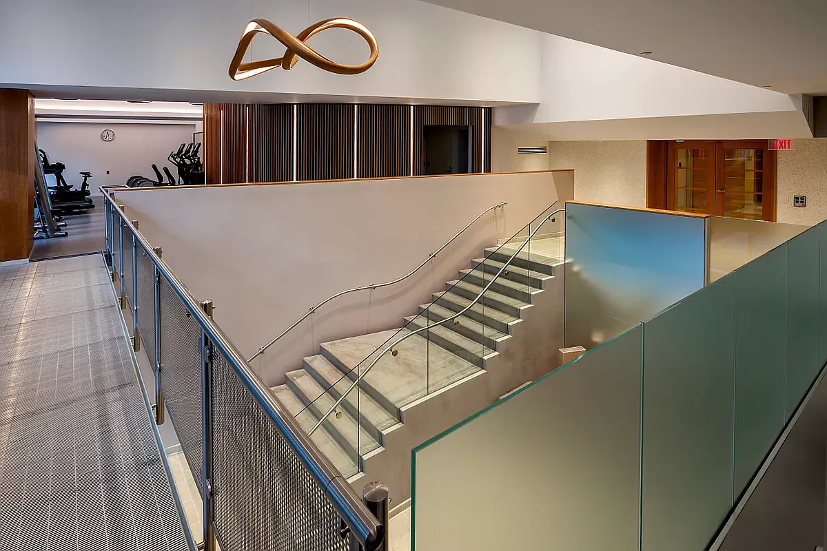 15 West 53rd Street, Unit 31C Manhattan, NY 10019 - Photo 13 of 14 a view of kitchen and hall with wooden floor