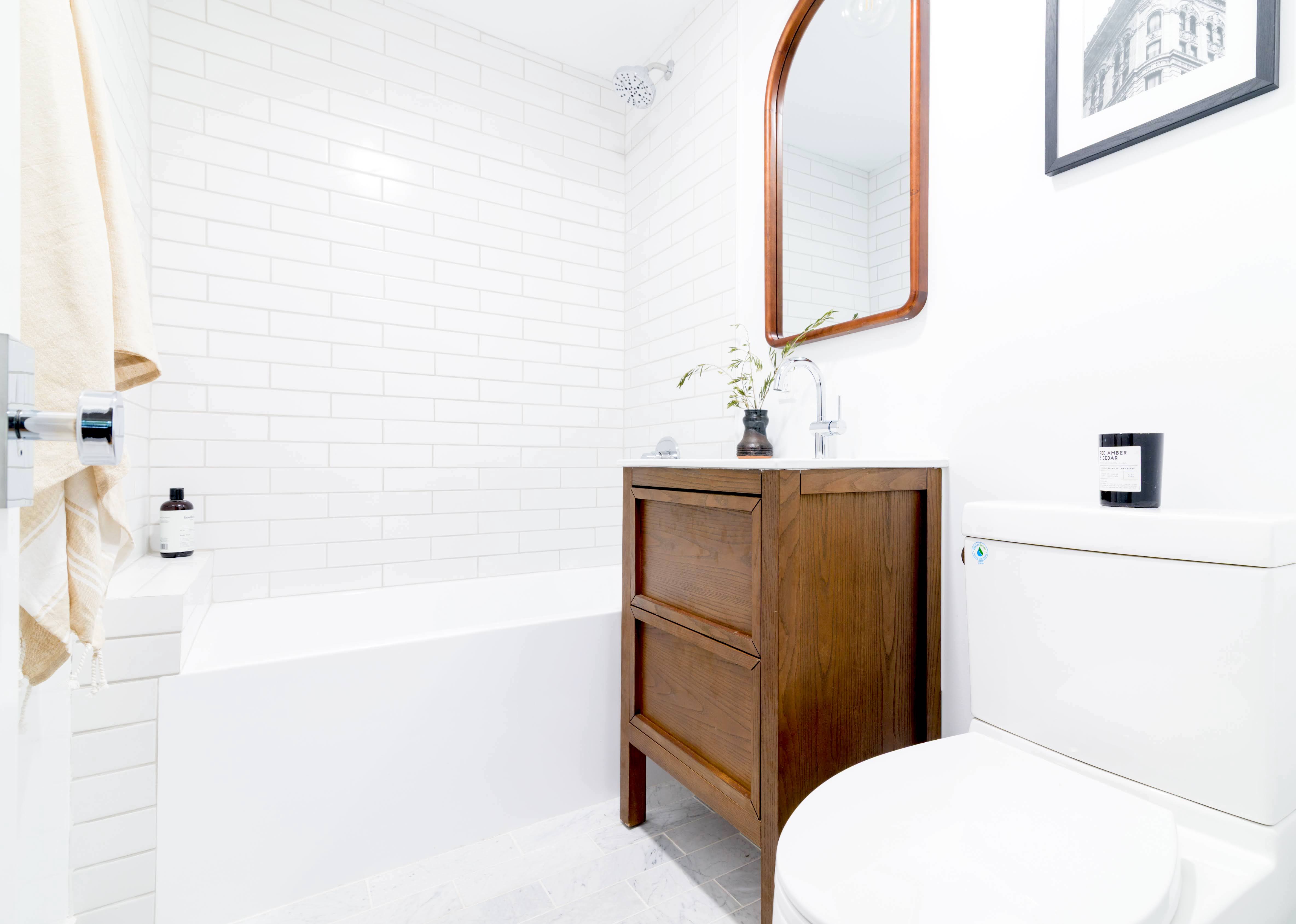 349 West 71st Street Manhattan, NY 10023 - Photo 9 of 21 a bathroom with a sink a toilet and bathtub