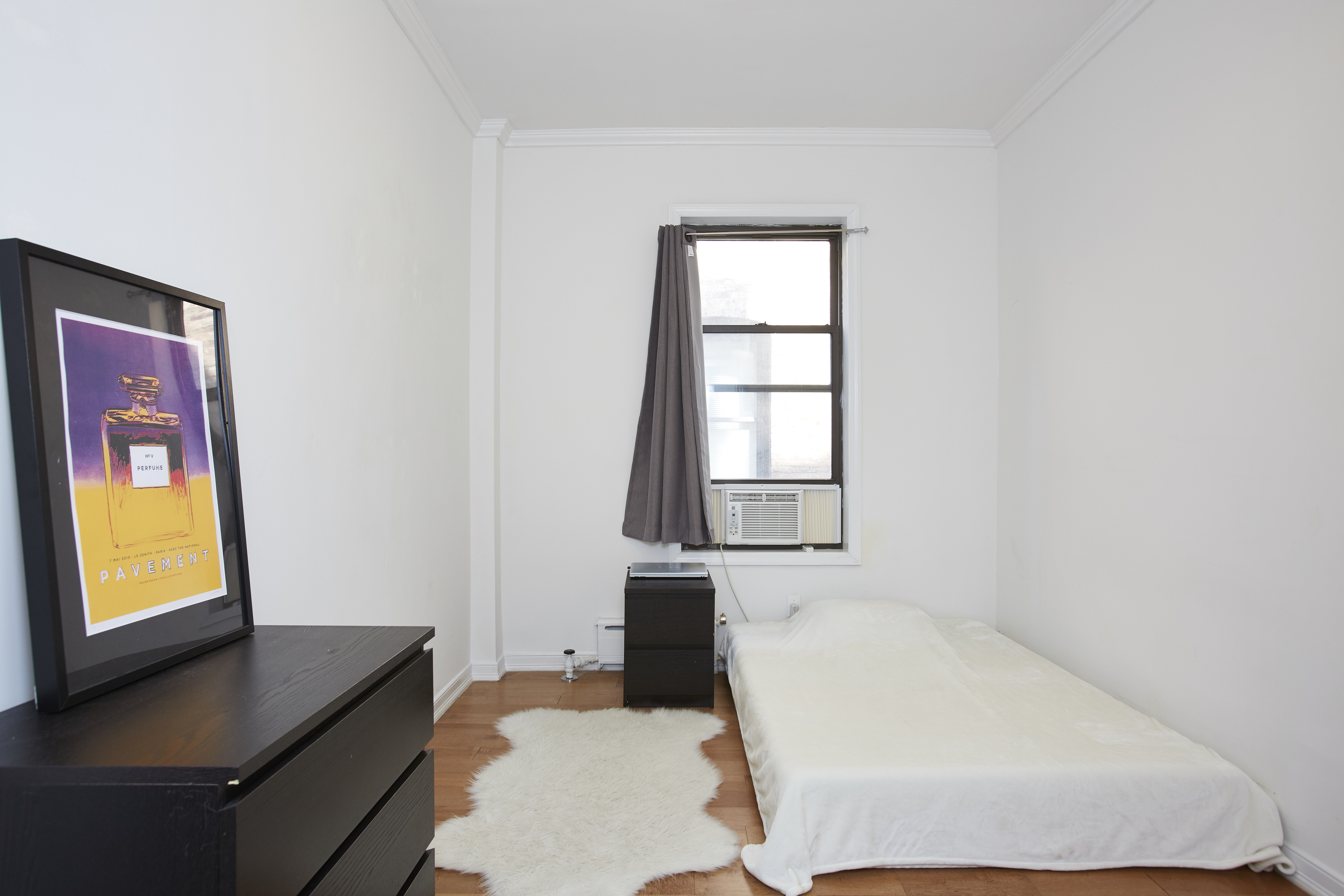 567 6th Street, Unit 7 Brooklyn, NY 11215 - Photo 6 of 9 a bedroom with a bed and a window