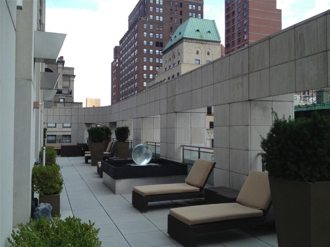 400 5th Avenue, Unit 35C Manhattan, NY 10018 - Photo 12 of 13 a view of a terrace with furniture