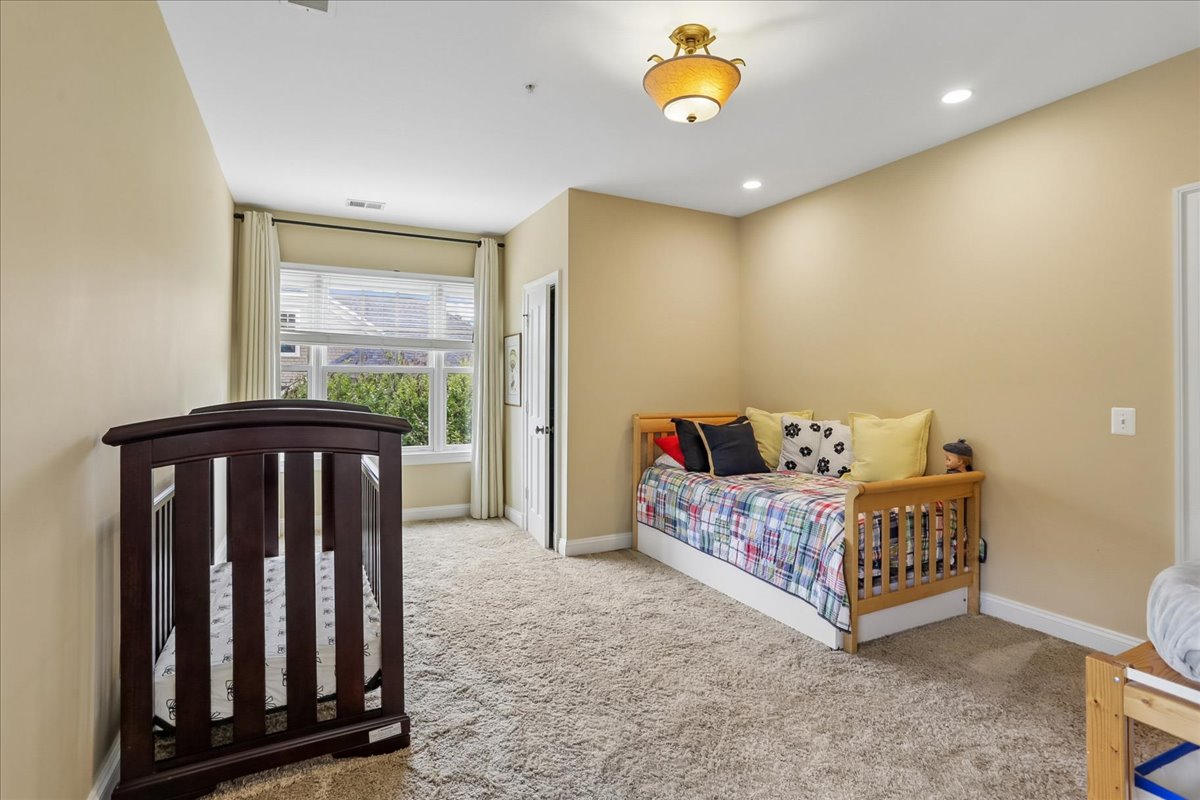 11736 Gainsborough Road Potomac, MD 20854 - Photo 63 of 90 a living room with furniture and a window