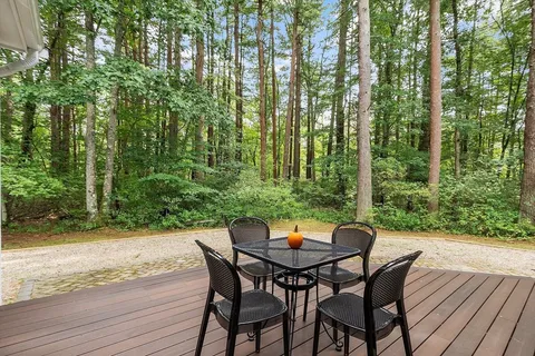a view of an outdoor space with furniture