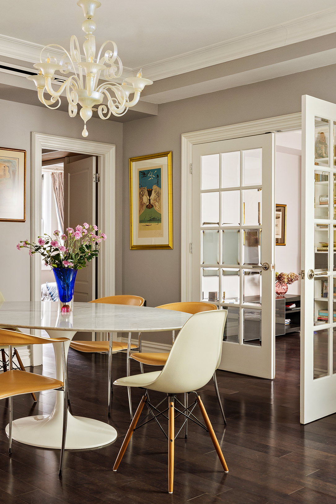 251 West 98th Street, Unit 7B Manhattan, NY 10025 - Photo 1 of 14 a dining room with wooden floor and chandelier