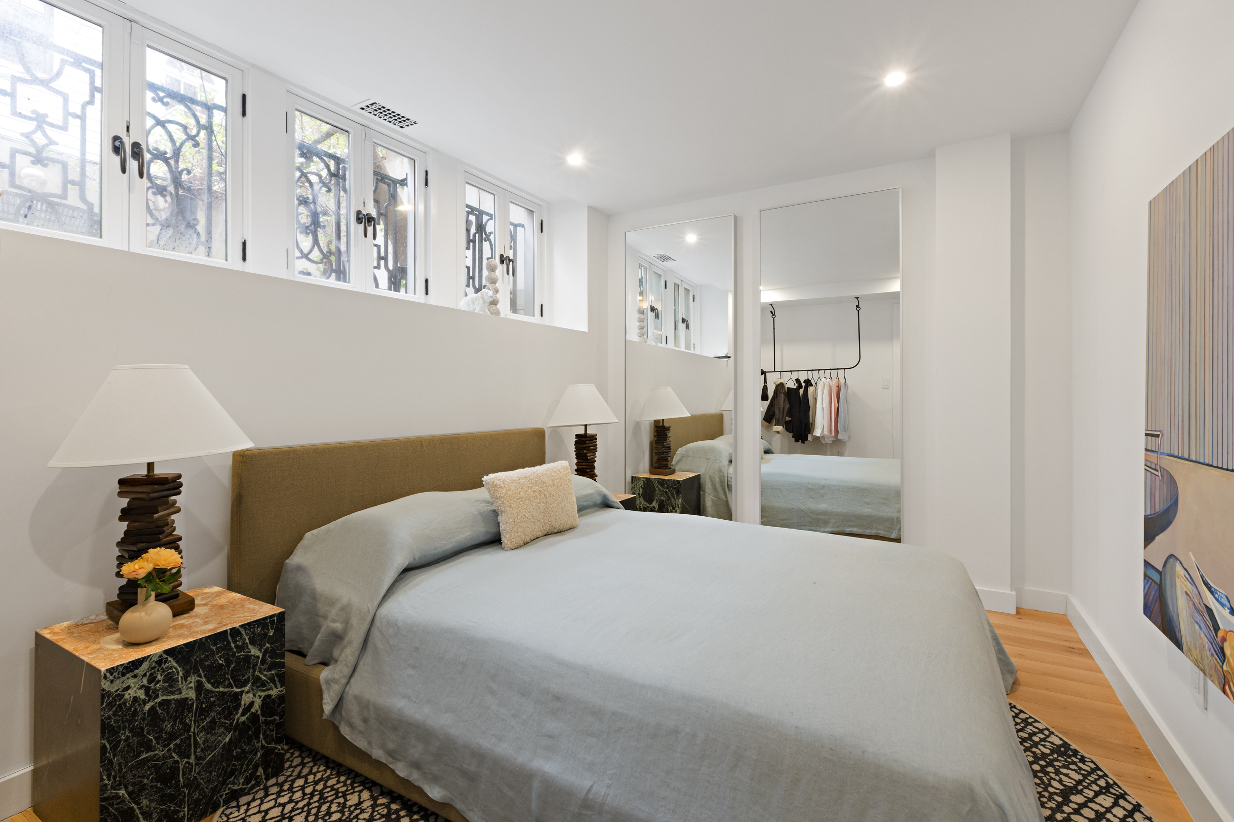 49 Barrow Street Manhattan, NY 10014 - Photo 20 of 25 a bedroom with bed and a painting on the wall