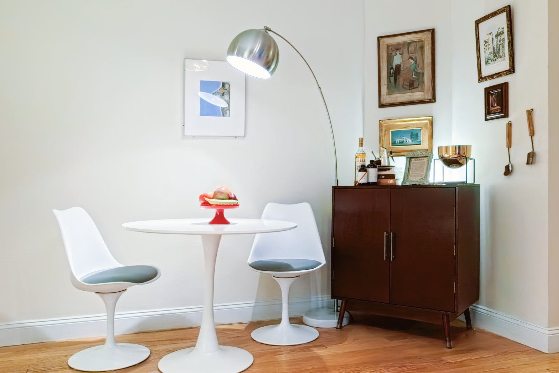 345 East 77th Street, Unit 3C Manhattan, NY 10075 - Photo 3 of 9 a dining room with furniture and wooden floor