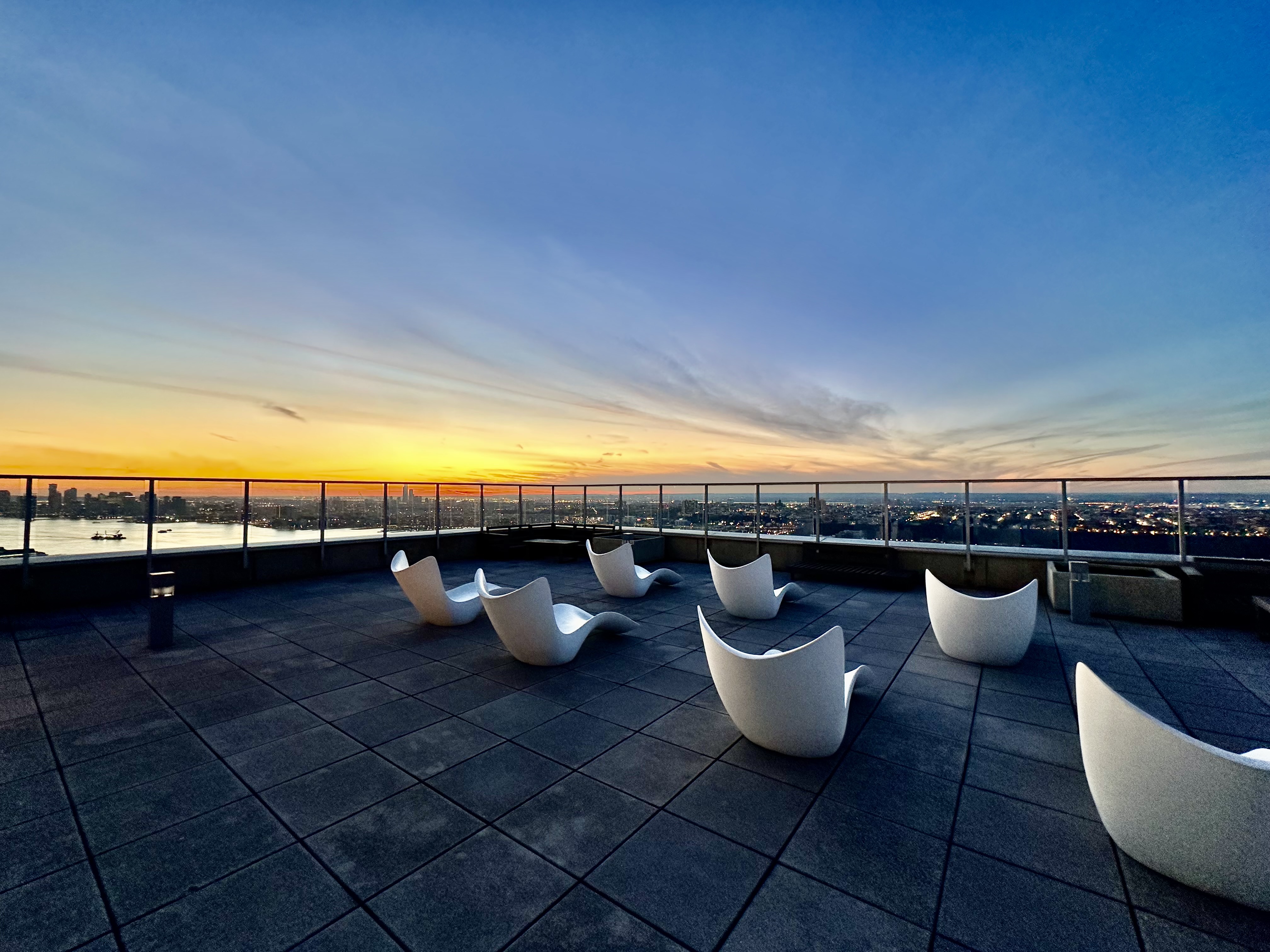 635 West 42nd Street, Unit 7F Manhattan, NY 10036 - Photo 6 of 7 a view of a swimming pool and lounge chair