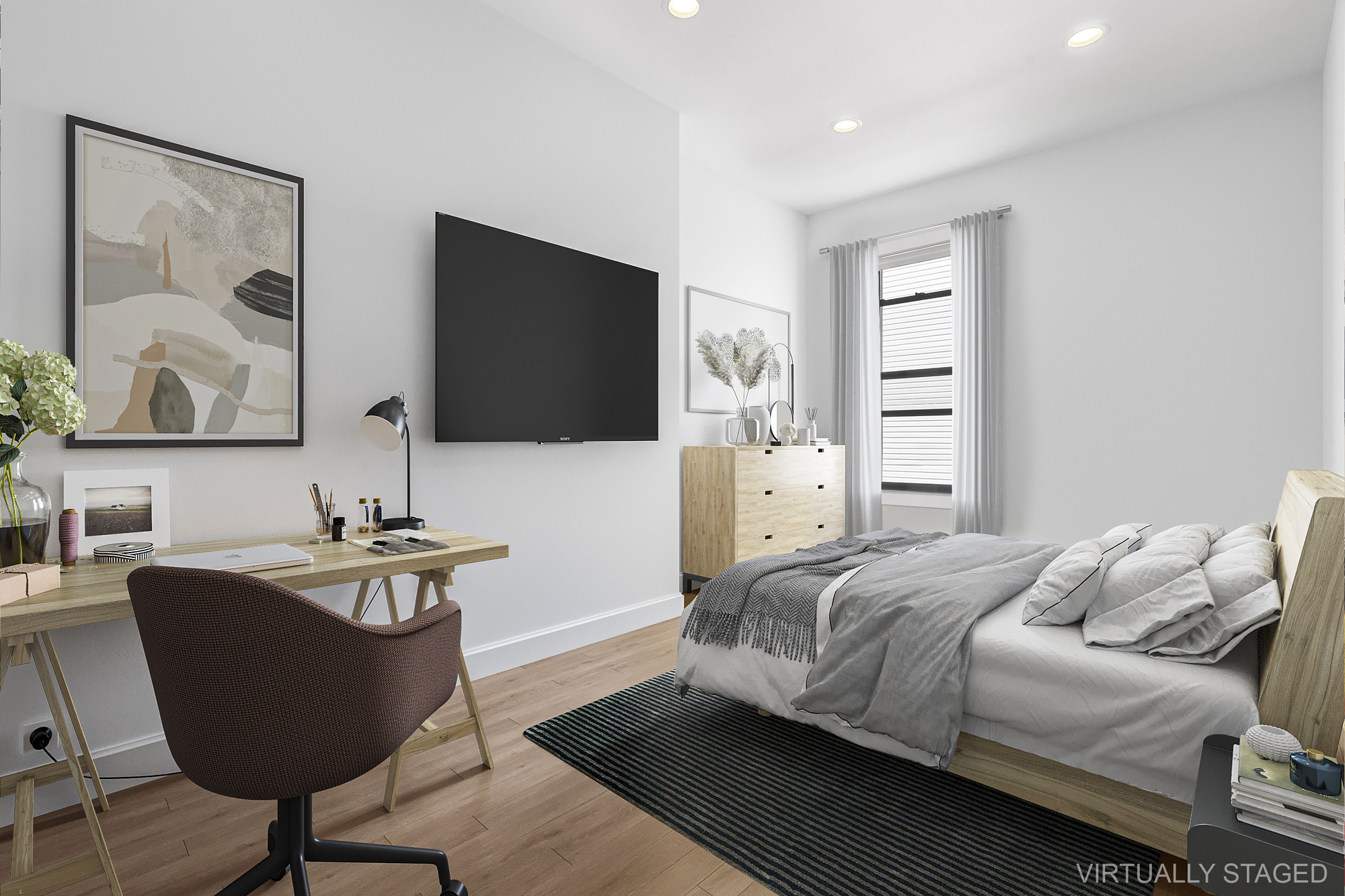 1273 Bushwick Avenue, Unit 2 Brooklyn, NY 11207 - Photo 4 of 9 a bedroom with a bed and a flat screen tv