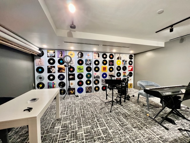 46-30 Center Boulevard, Unit 406 Queens, NY 11109 - Photo 17 of 24 a room with a black white checkered floor and a white countertops with wooden floor