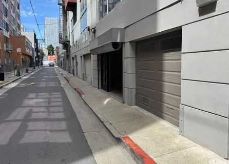 a view of a pathway along the building