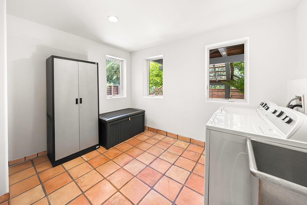 161 Loureyro Road Montecito, CA 93108 - Photo 25 of 52 a kitchen with a refrigerator and window