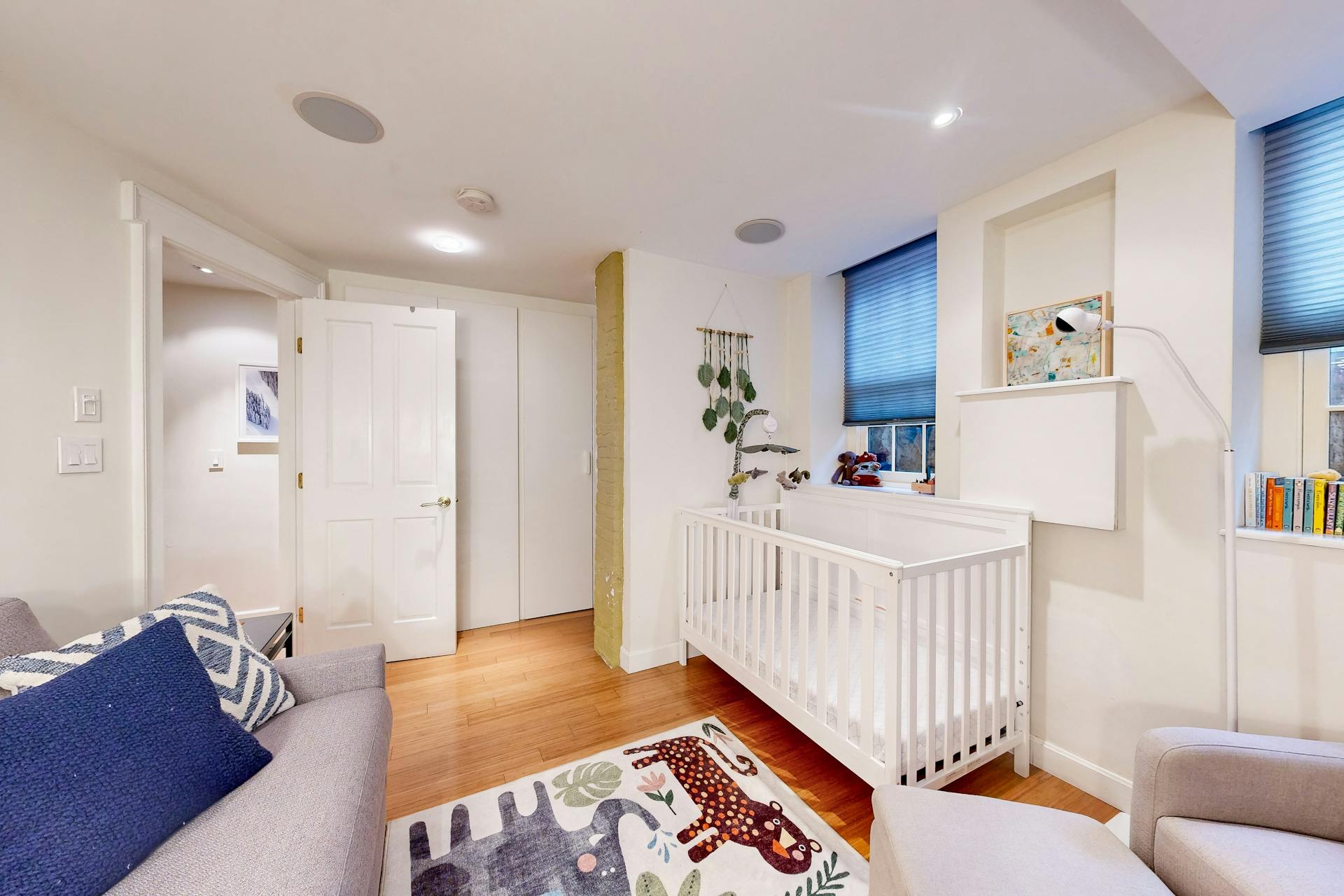 11 Fayette Street, Unit 1 Boston, MA 02116 - Photo 23 of 33 a bedroom with furniture and a wooden floor