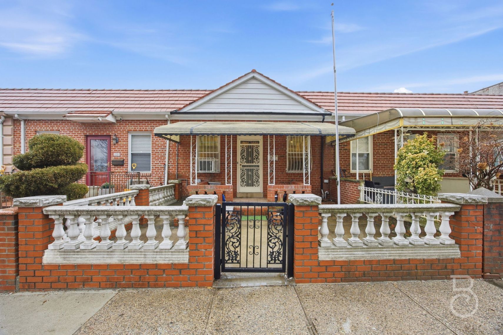 front view of a house with a balcony