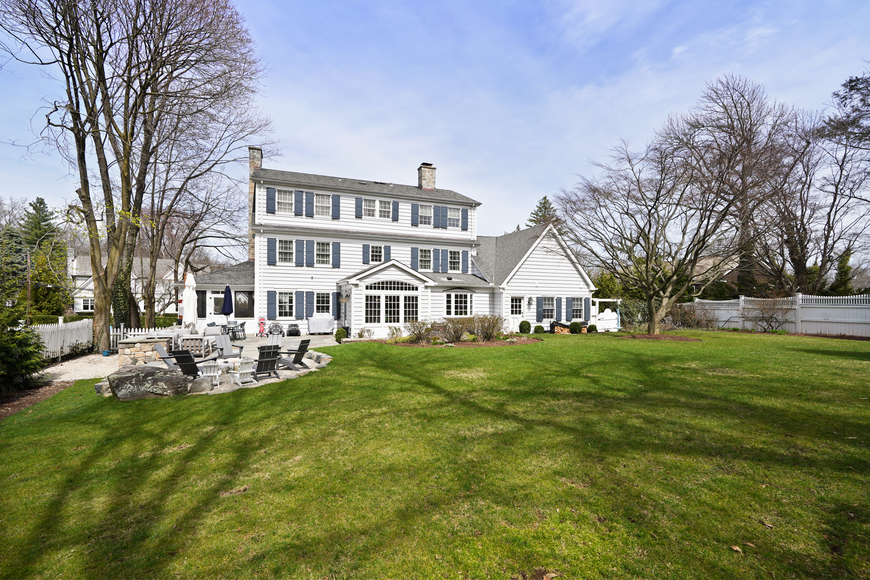 15 Anderson Road Greenwich, CT 06830 - Photo 26 of 30 a view of a house with a big yard and large trees