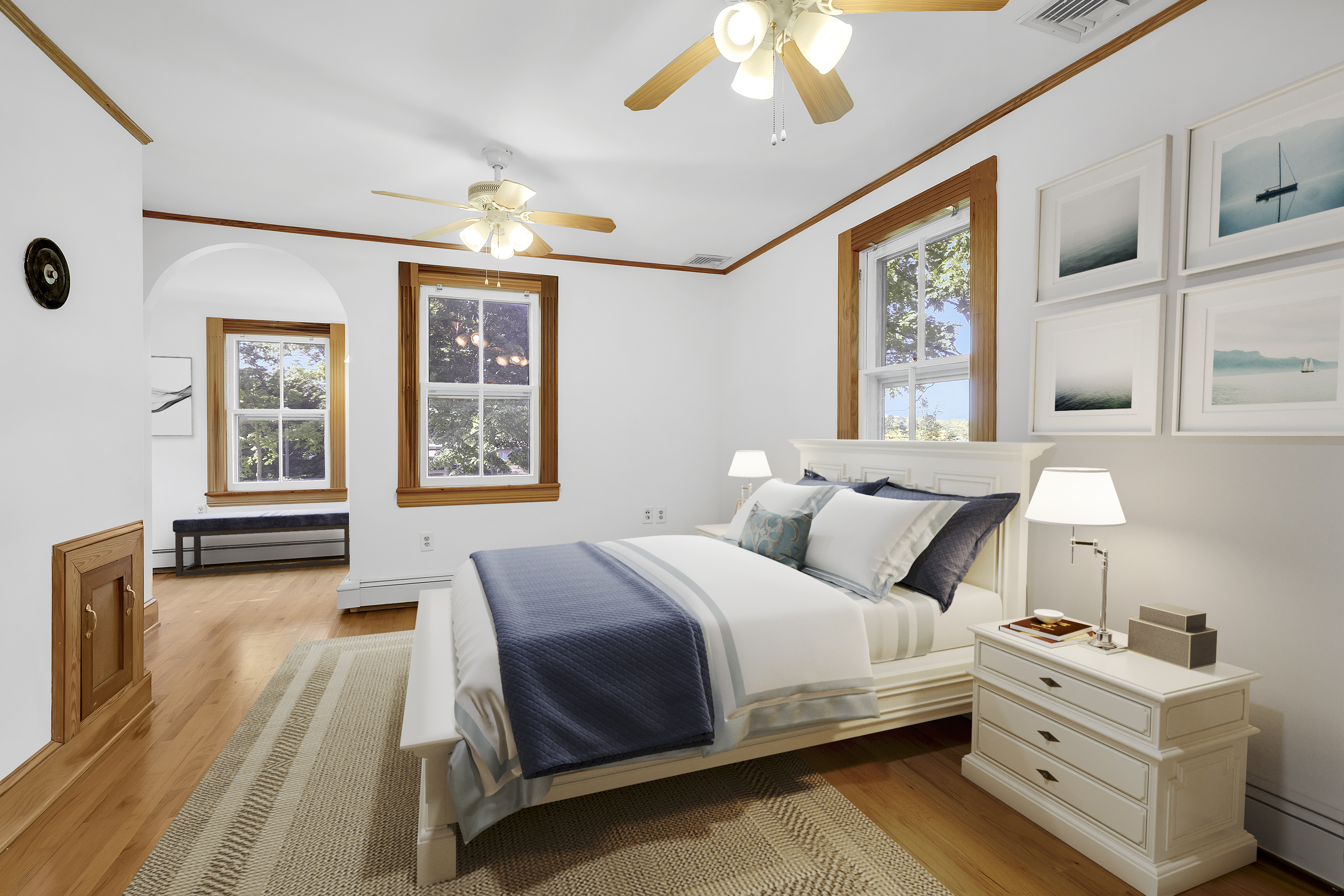 242-09 Pine Street Queens, NY 11363 - Photo 4 of 21 a bedroom with a bed and a chandelier