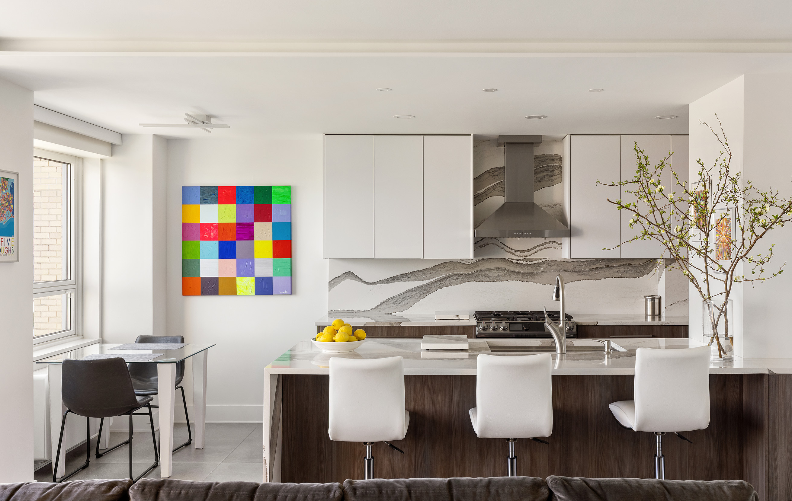 535 East 86th Street, Unit 16F Manhattan, NY 10028 - Photo 5 of 19 a kitchen with a sink cabinets and window