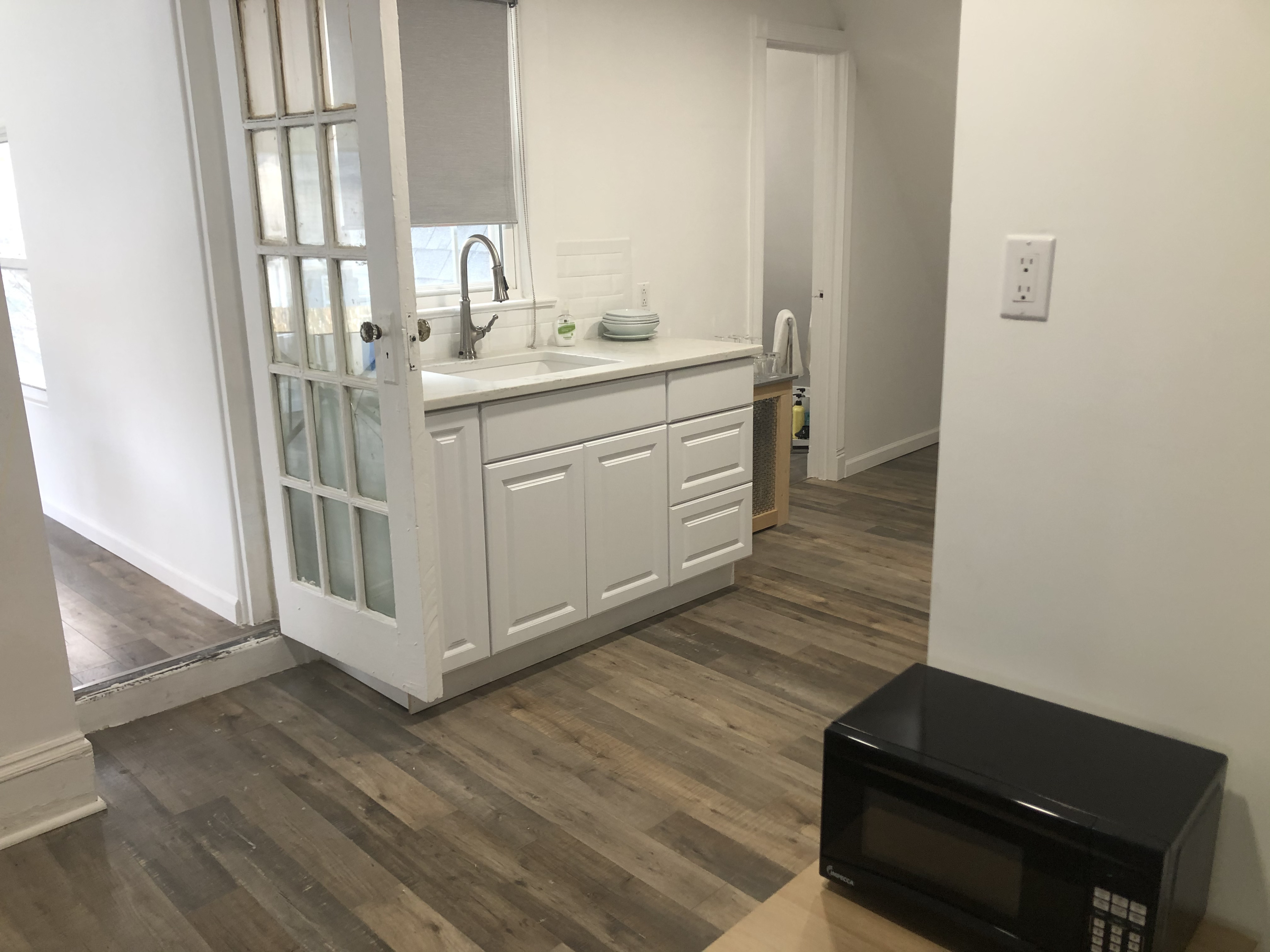 1112 Beverley Road Brooklyn, NY 11218 - Photo 14 of 53 a kitchen with a sink and cabinets