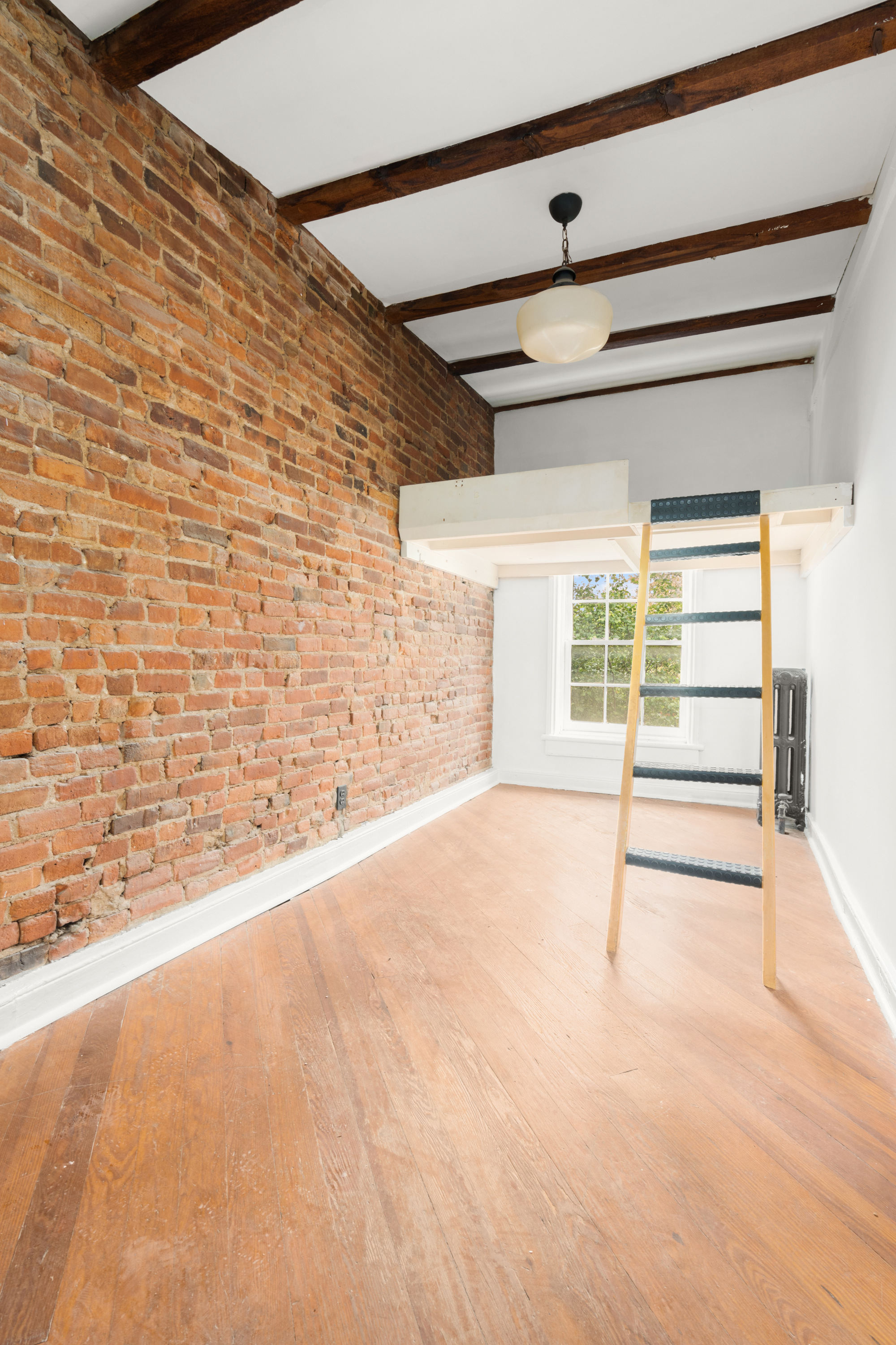 217 Dean Street Brooklyn, NY 11217 - Photo 17 of 26 a view of an empty room with a window