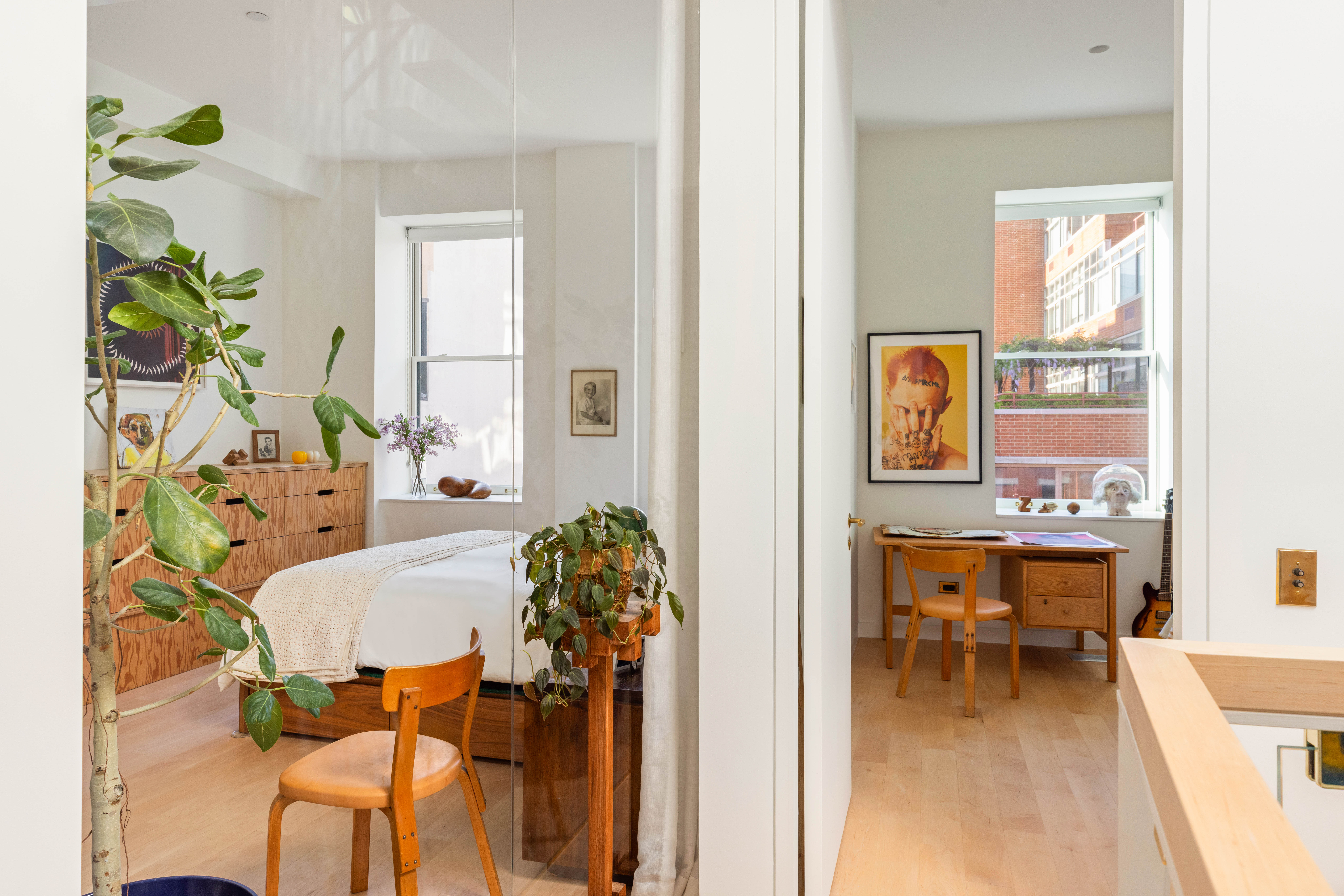 130 Jane Street, Unit 5/6F Manhattan, NY 10014 - Photo 14 of 23 a living room with furniture and a potted plant
