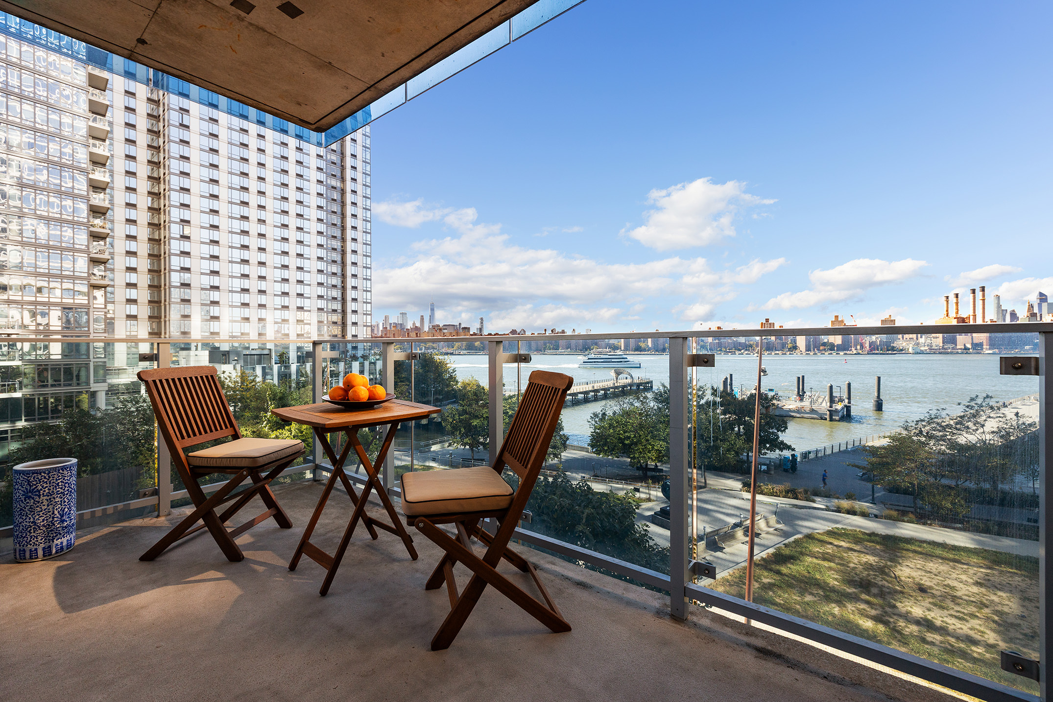 22 North 6th Street, Unit 5C Brooklyn, NY 11249 - Photo 3 of 19 a view of a chairs and table in patio