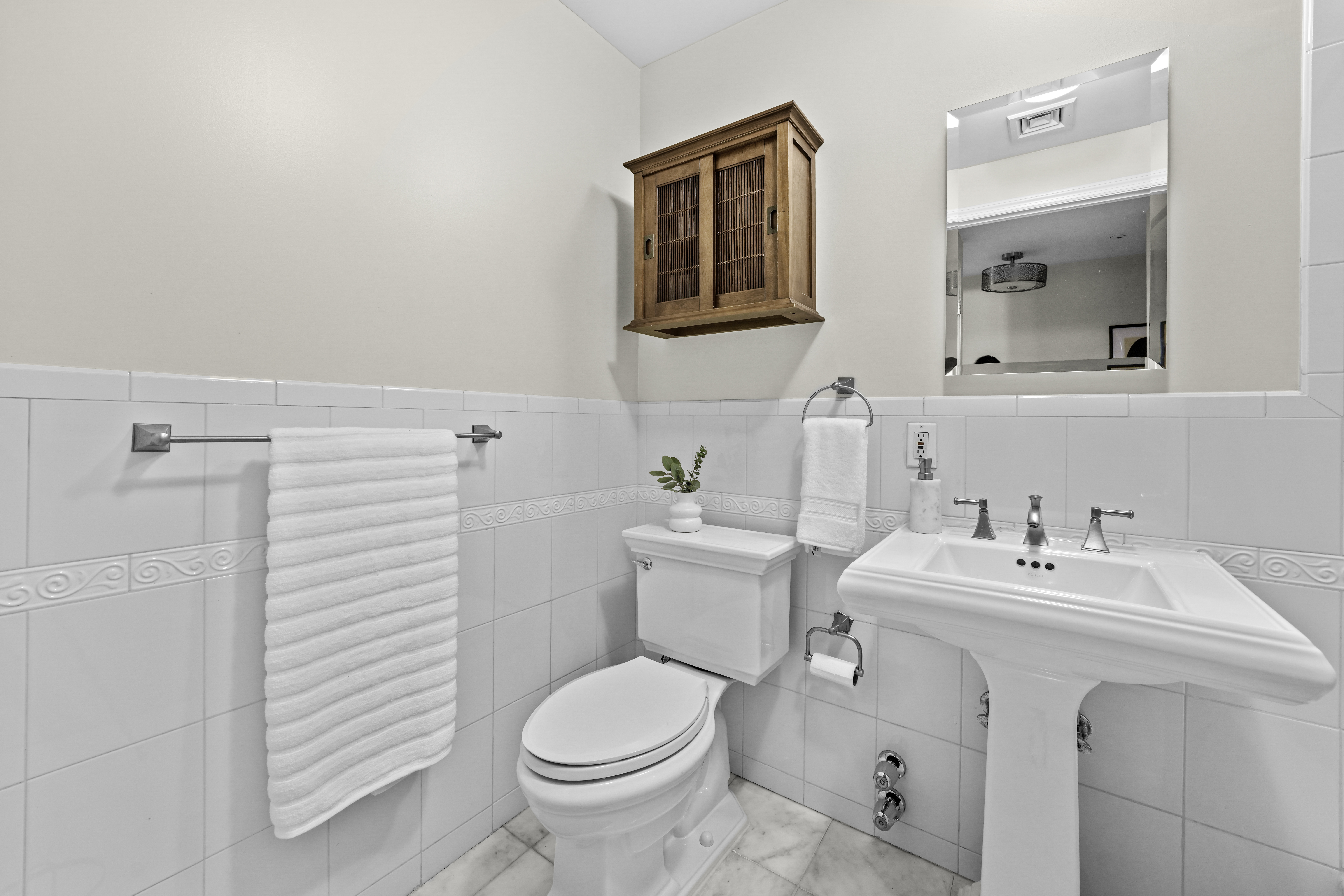 714 St Nicholas Avenue, Unit 1 Manhattan, NY 10031 - Photo 14 of 18 a bathroom with a sink toilet and mirror