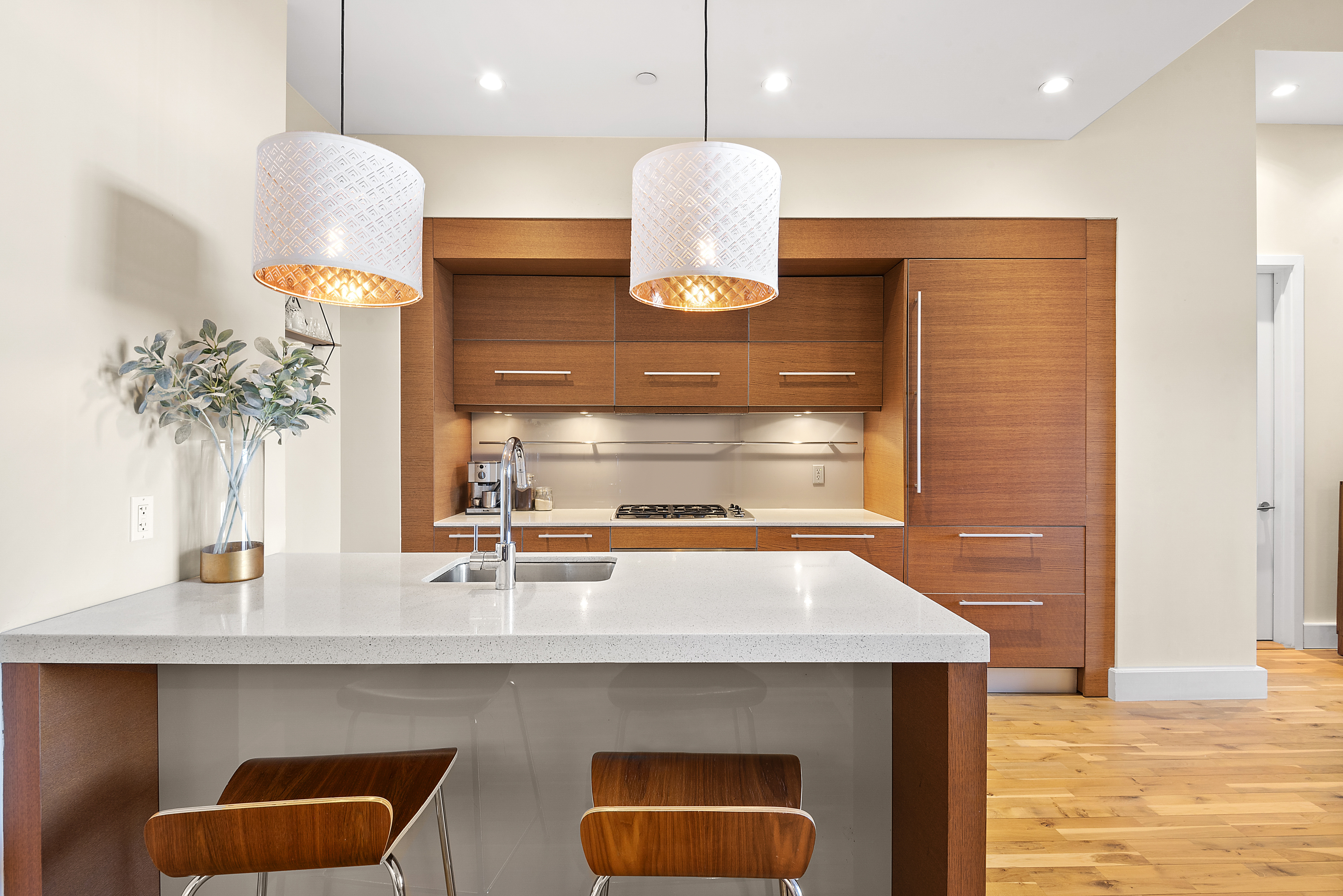 360 Furman Street, Unit 723/724 Brooklyn, NY 11201 - Photo 13 of 63 a kitchen with a sink a counter space and cabinets