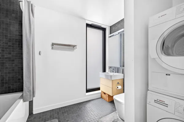 a room with a washer and dryer