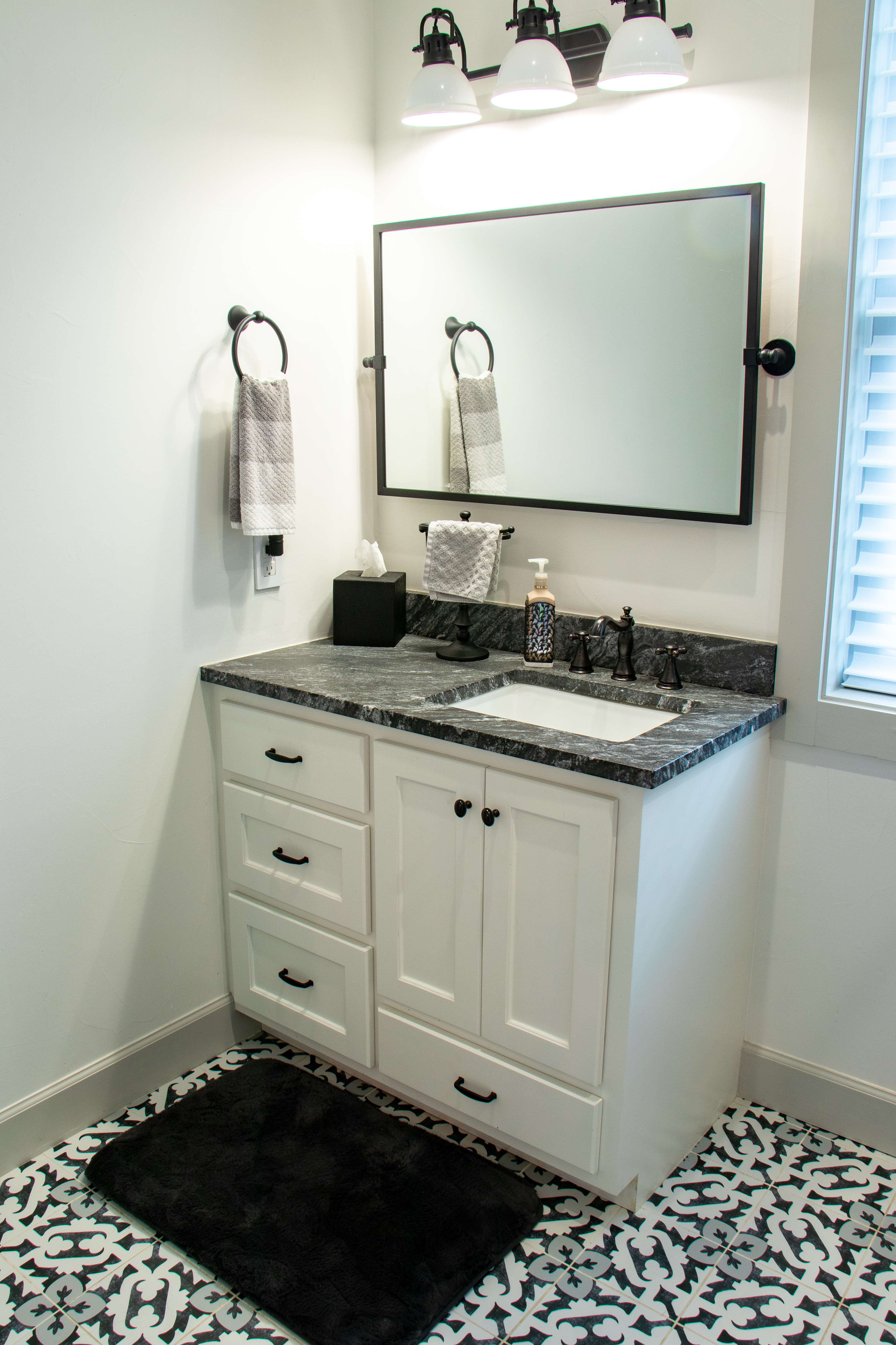 272 Slate Rock Road Willow City, TX 78675 - Photo 11 of 30 a bathroom with a sink and a mirror