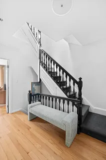 a view of entryway with wooden floor