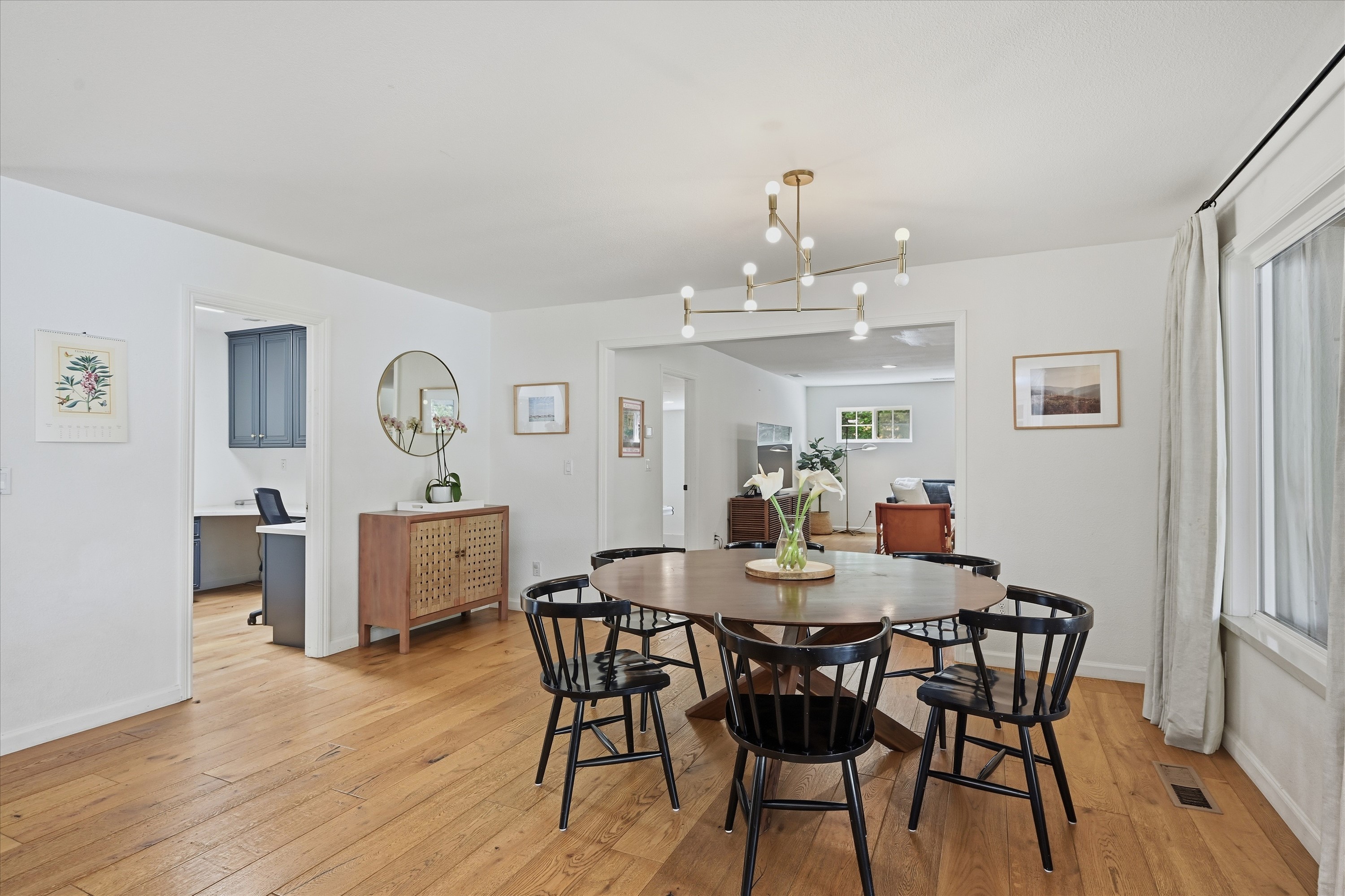 1541 Chablis Road Healdsburg, CA 95448 - Photo 6 of 19 a view of a dining room with furniture and wooden floor