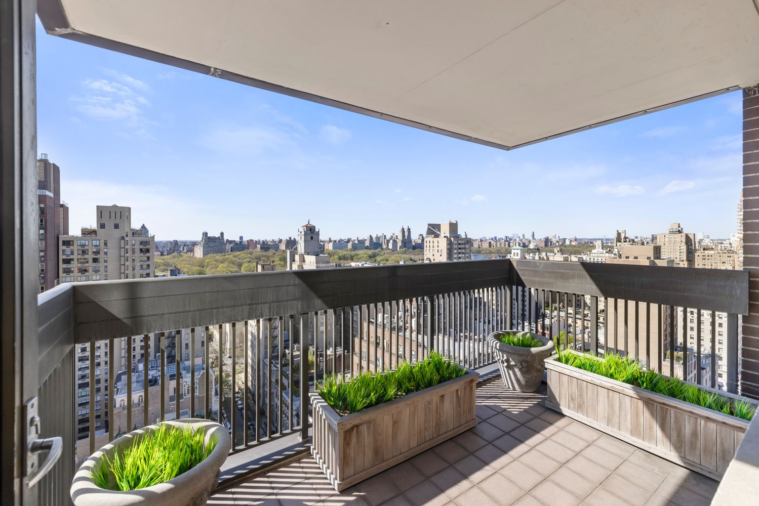 40 East 80th Street, Unit 25A Manhattan, NY 10075 - Photo 17 of 18 a view of a balcony with wooden floor