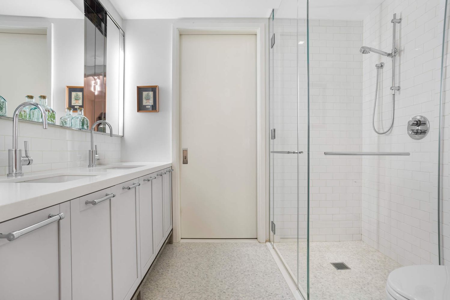 182 West 82nd Street, Unit 4E Manhattan, NY 10024 - Photo 19 of 25 a bathroom with a shower sink and mirror