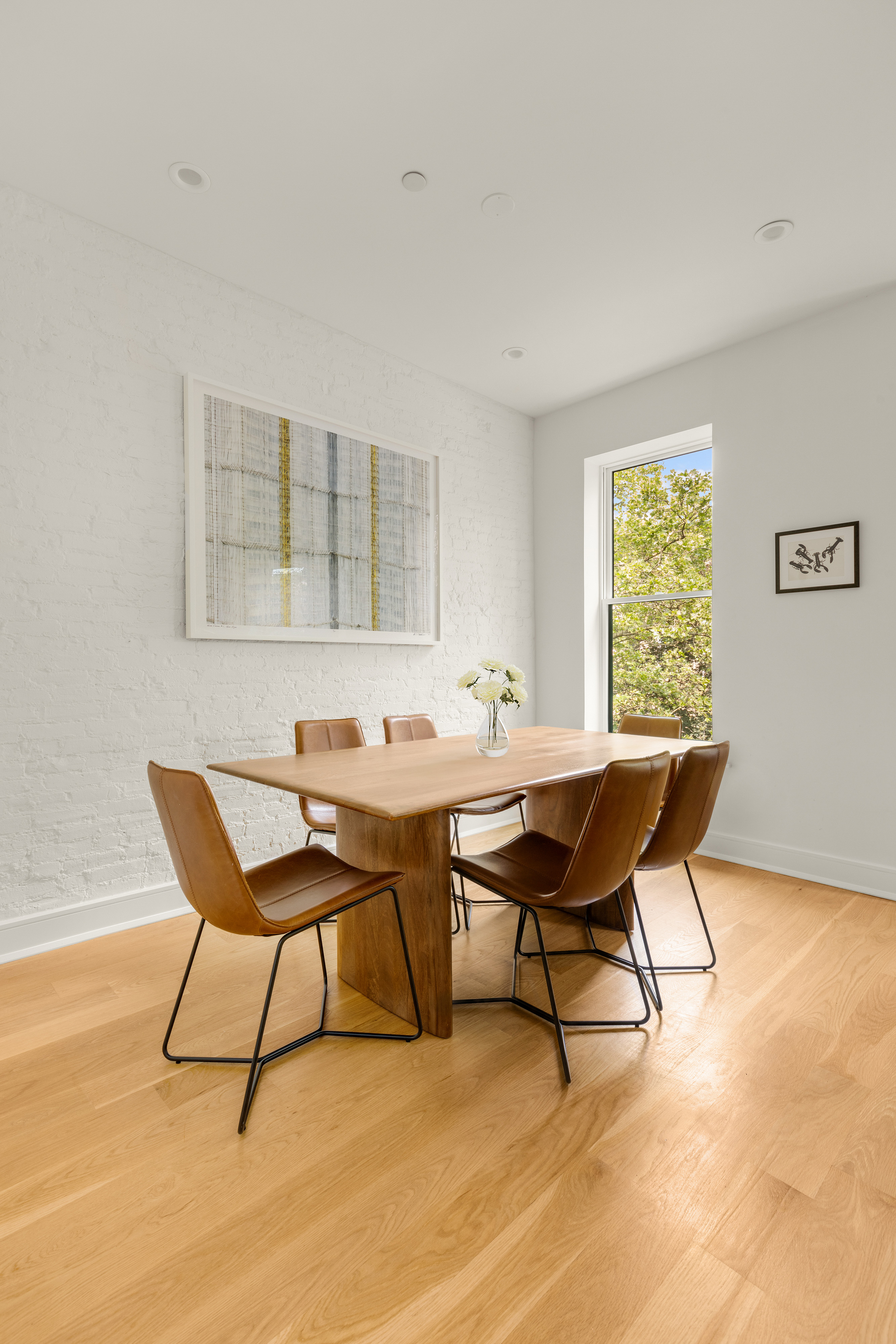 352 6th Avenue, Unit 3 Brooklyn, NY 11215 - Photo 2 of 14 a dining room with furniture and window