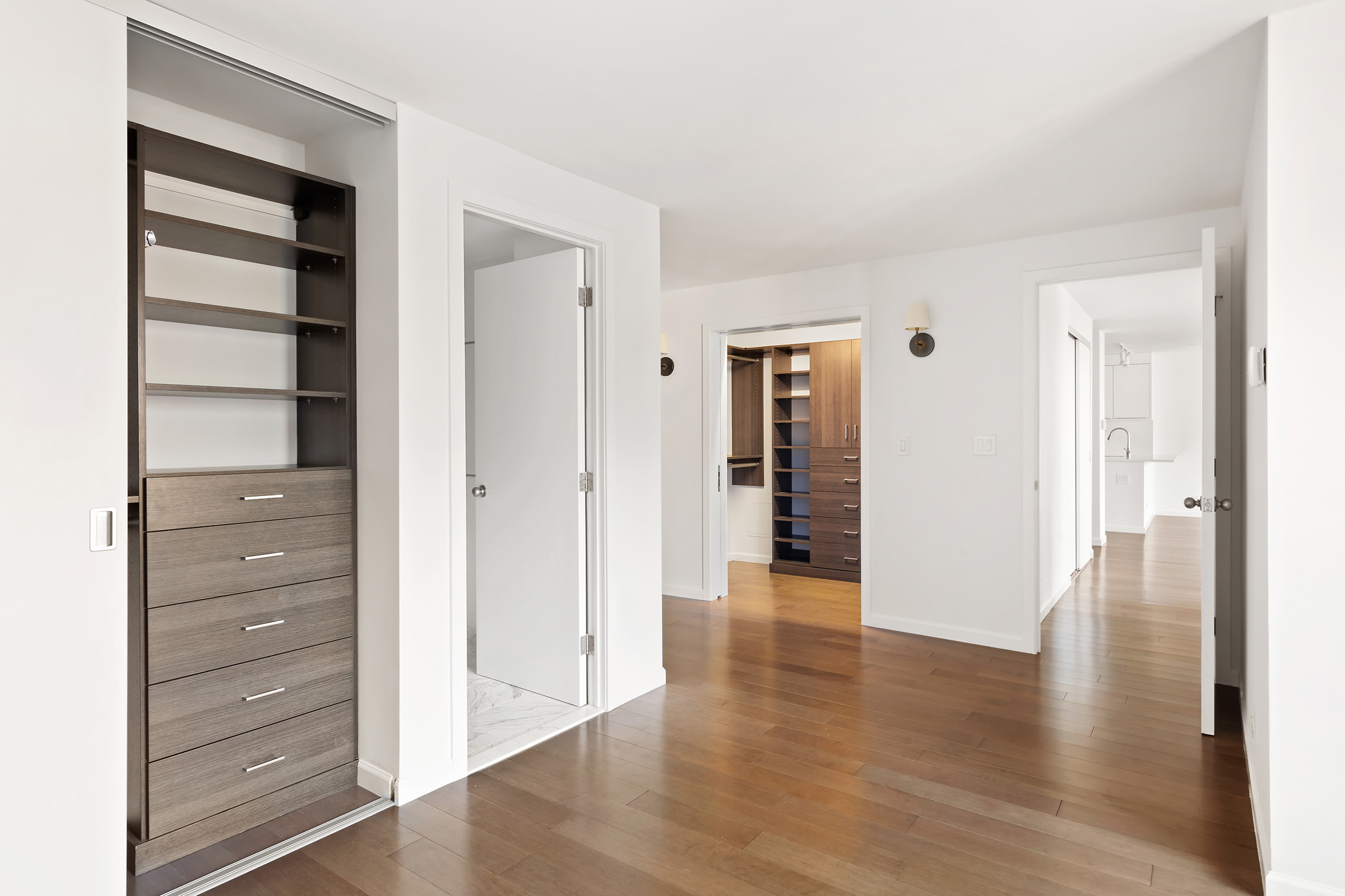 270 West 17th Street, Unit 11BC Manhattan, NY 10011 - Photo 9 of 13 a view of an entryway with wooden floor