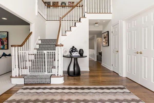 a living room with furniture and white walls