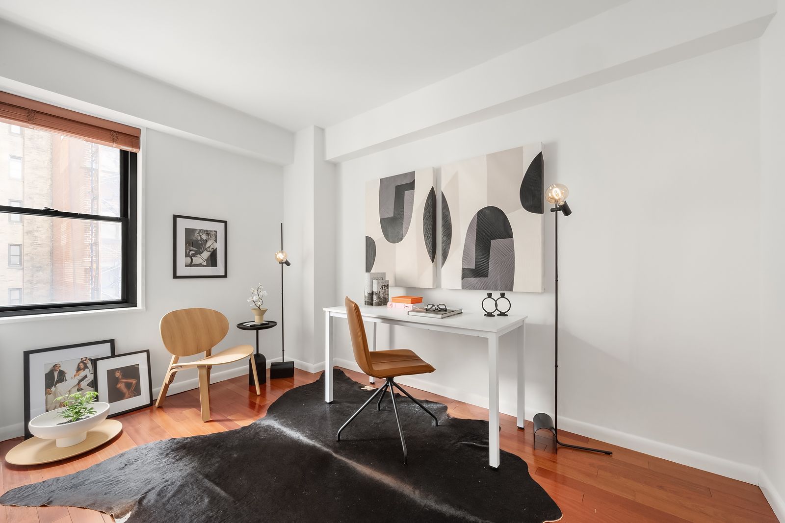 178 East 80th Street, Unit 7F Manhattan, NY 10075 - Photo 7 of 10 a living room with furniture and a window