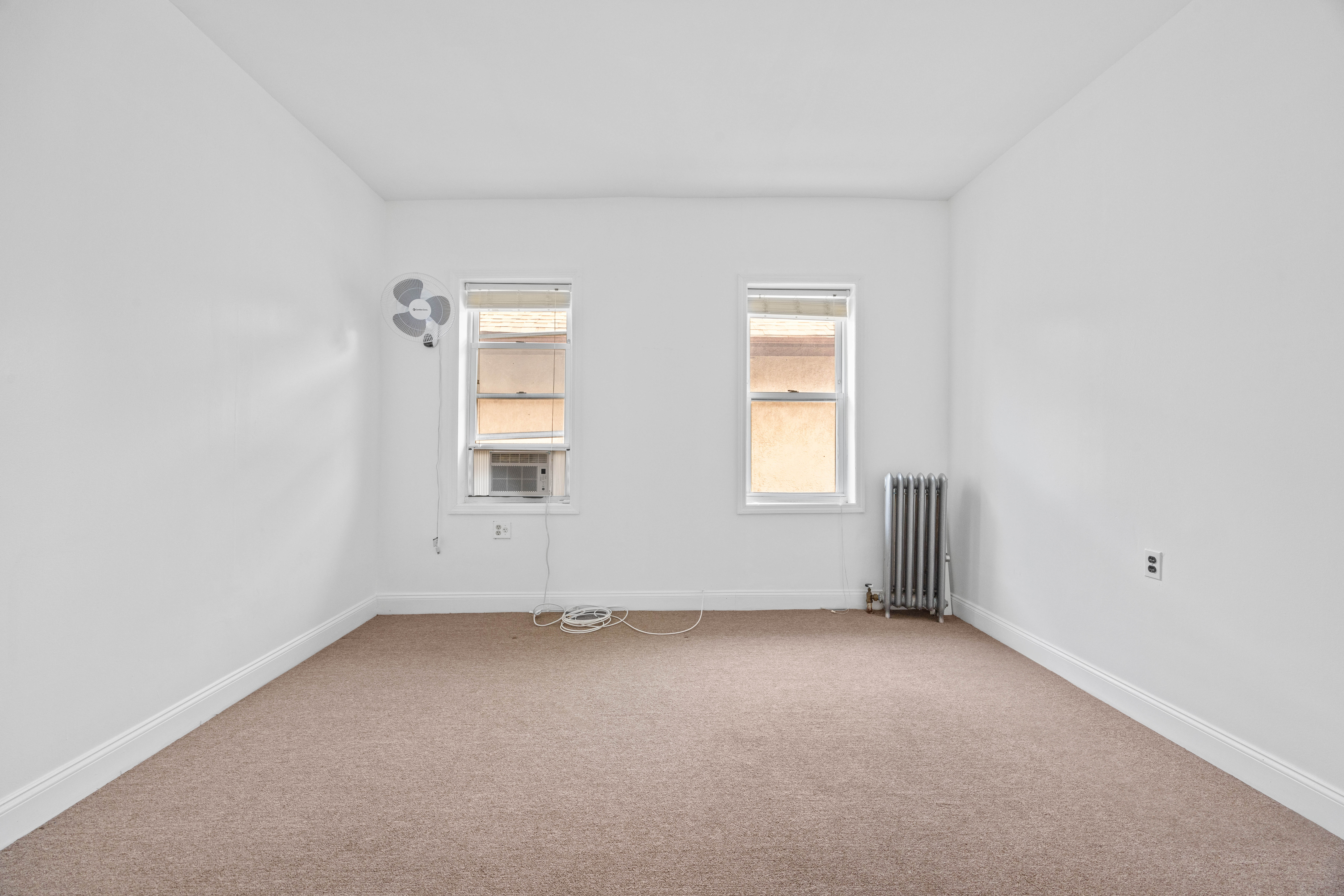 3712 Oceanic Avenue, Unit 2 Brooklyn, NY 11224 - Photo 11 of 14 an empty room with a window