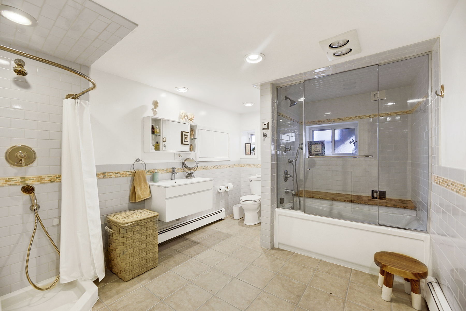 4-53 Beach 142nd Street Queens, NY 11694 - Photo 30 of 39 a bathroom with a tub sink shower and mirror