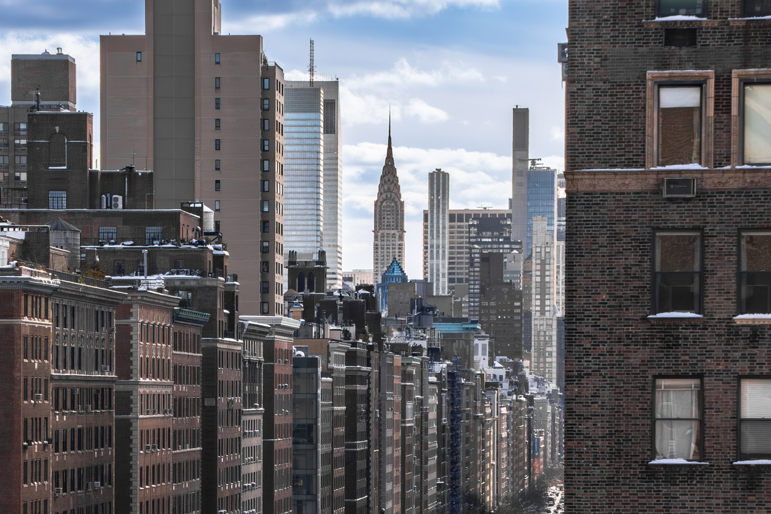 a city view with tall buildings