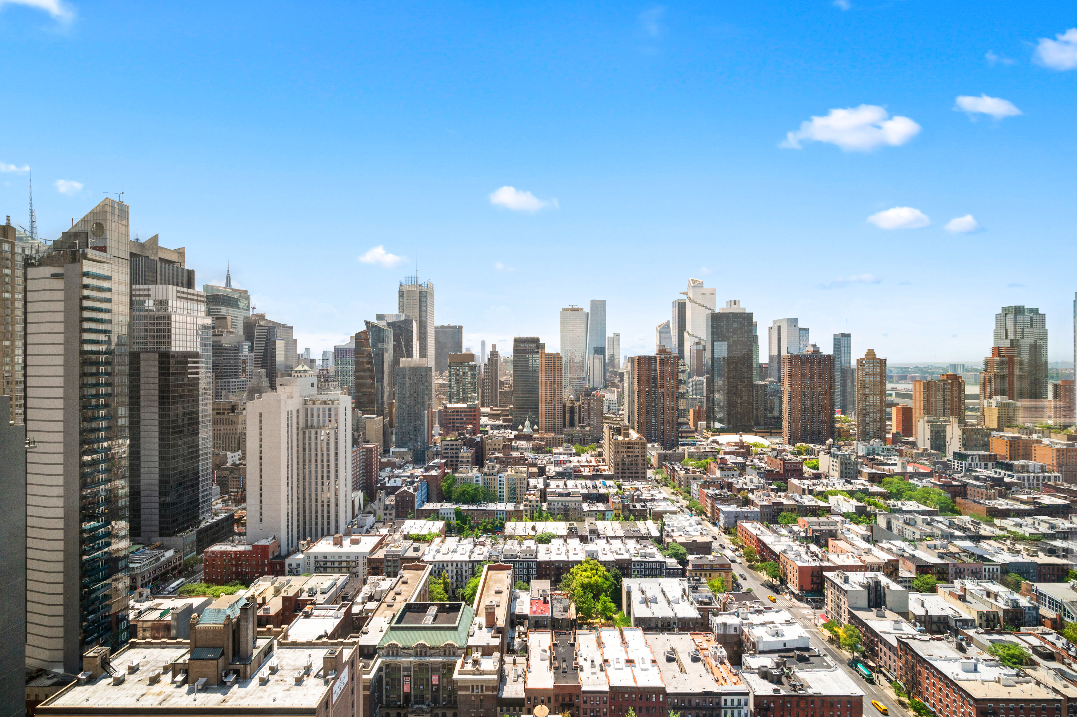 350 West 50th Street, Unit PH4B Manhattan, NY 10019 - Photo 4 of 18 a view of a city with tall buildings